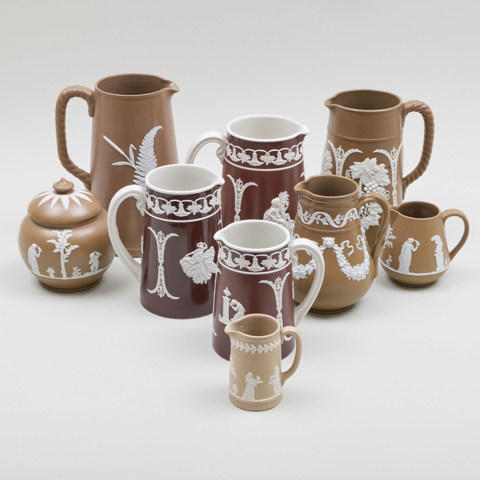 Group of Eight English Jasperware Pitchers and a Jar and Cover (1 of 20)