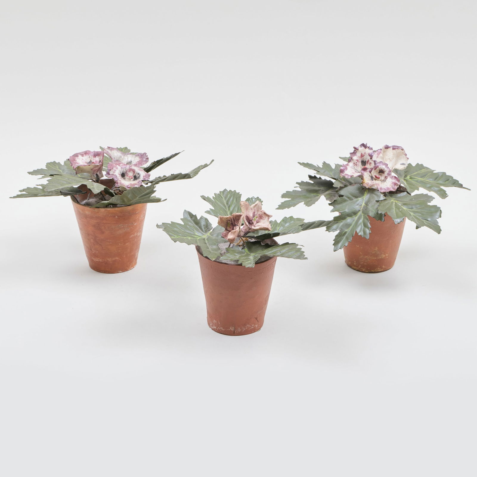 Three Tole and Terracotta Models of Flowers (1 of 11)