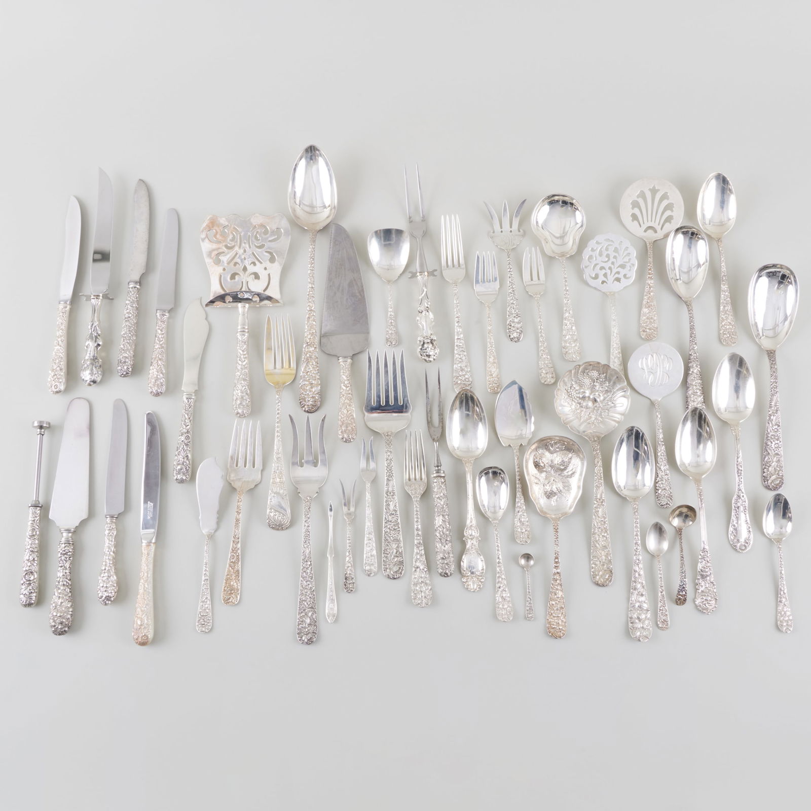 Extensive Assembled Flower Repousse Flatware Service (1 of 20)
