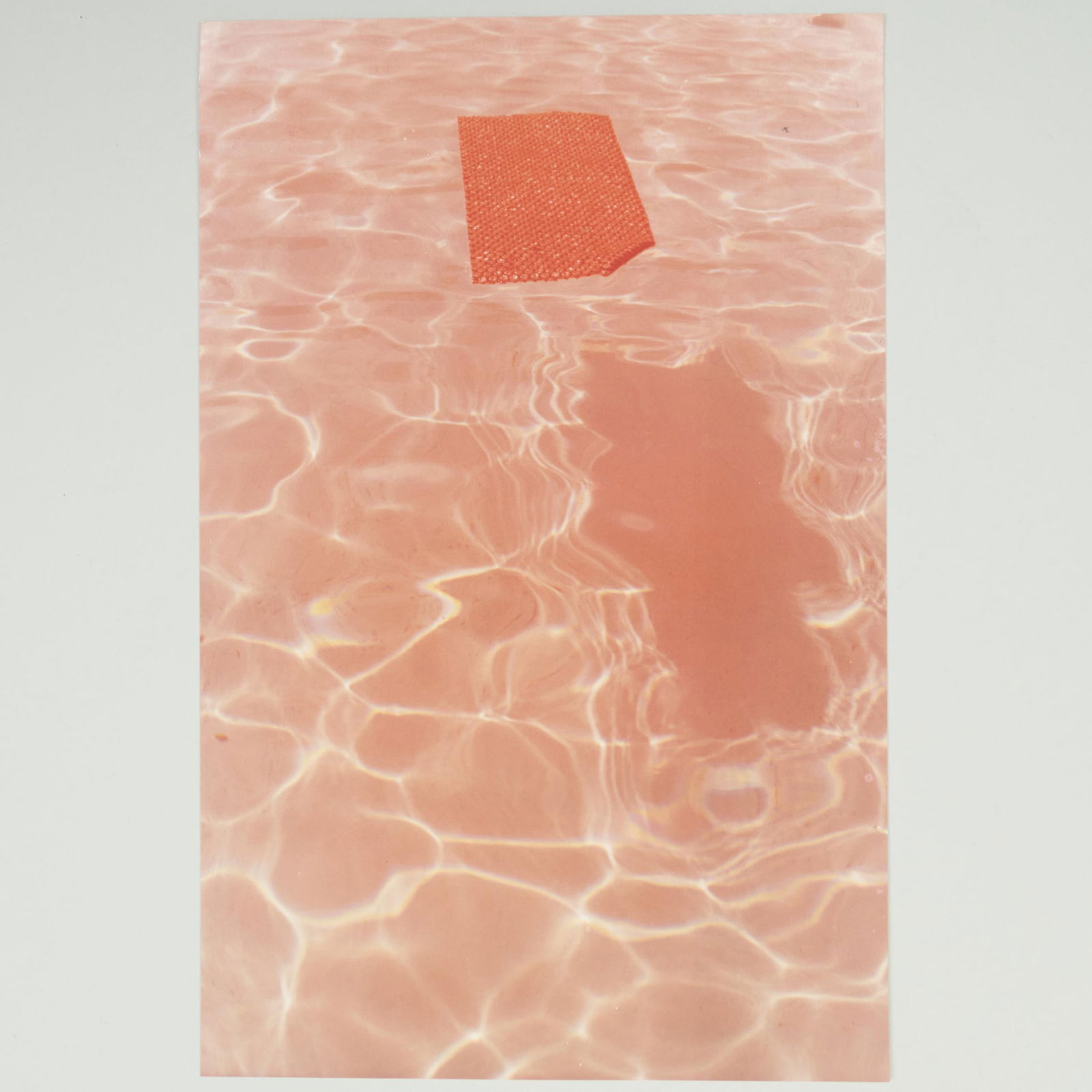David Hockney (b. 1937): Mat Floating in Pool, Fire Island (1 of 3)