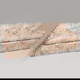 Large Cotton Chintz Slip Covered Three Seat Sofa, Designed by Colefax and Fowler: Large Cotton Chintz Slip Covered Three Seat Sofa, Designed by Colefax and FowlerRaised on brass casters.33 x 8 ft. x 40 in., seat height 19 in.A New York Apartment Designed by Vivien Greenock of