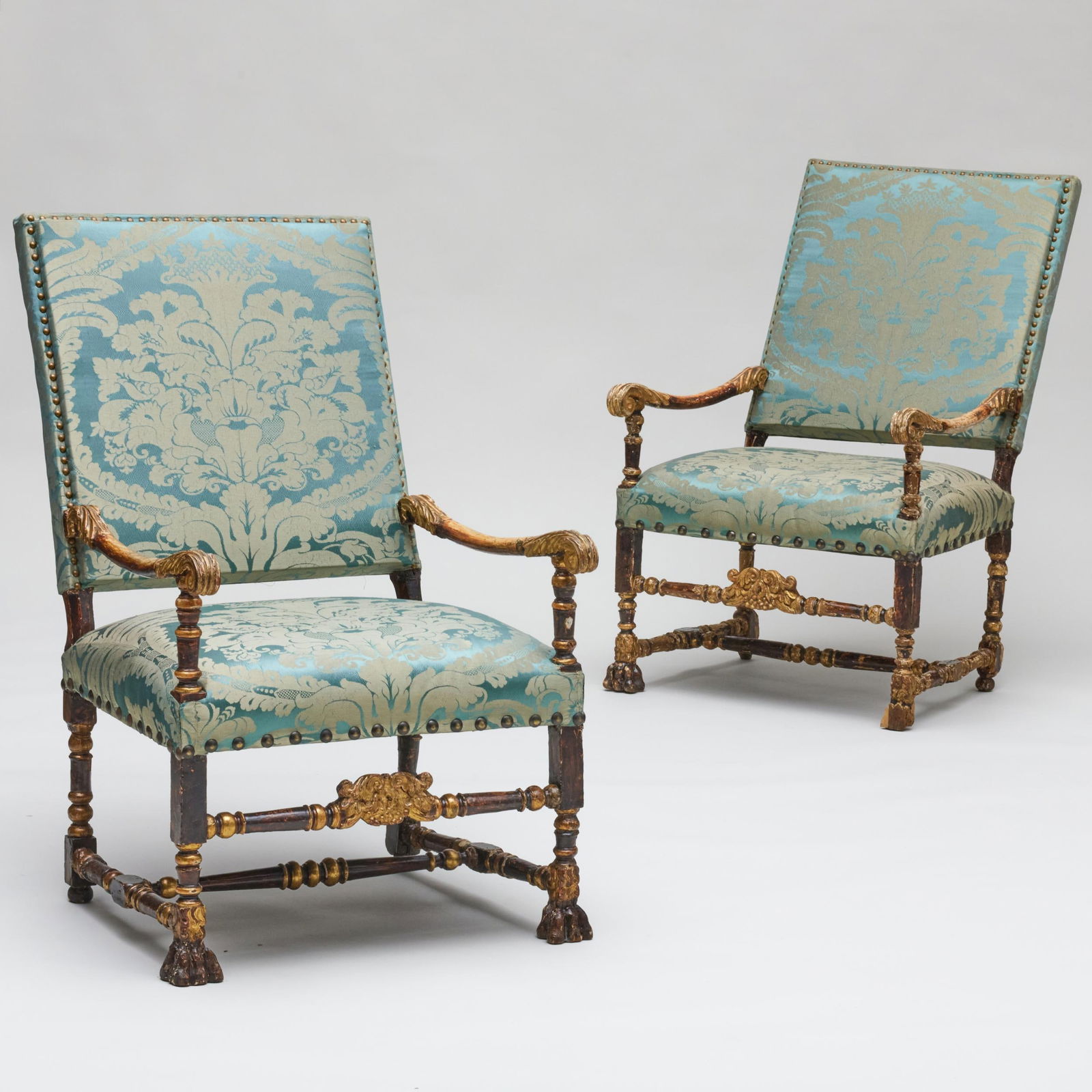 Near Pair of Italian Baroque Faux Bois Painted and Parcel-Gilt Tall Back Armchairs: Near Pair of Italian Baroque Faux Bois Painted and Parcel-Gilt Tall Back Armchairs One of later date. Both upholstered in silk damask. 42 x 24 3/4 x 33 3/4 in., seat height 18 1/2 in. A New York Apart