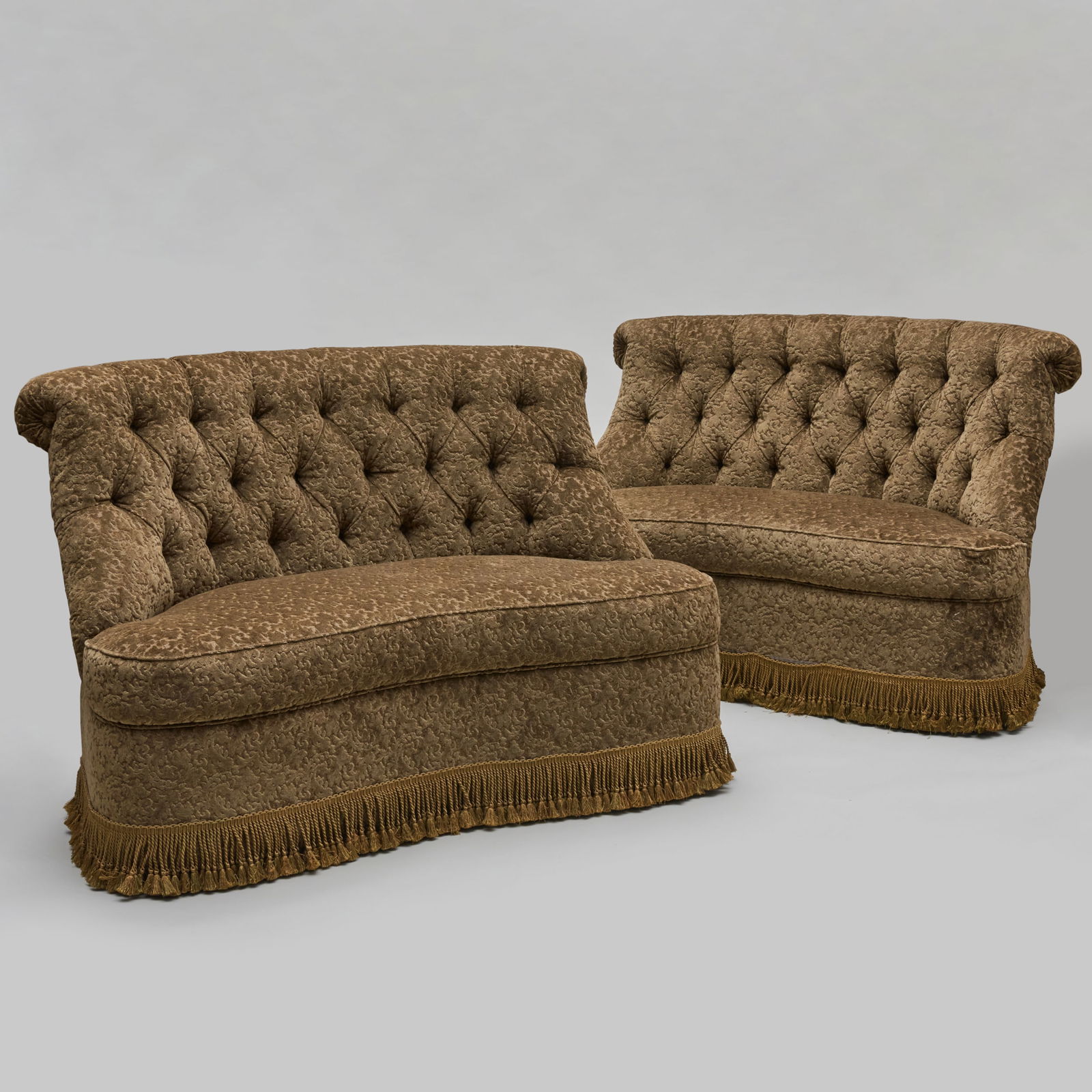 Pair of Tufted Upholstered Velvet Damask Scrollback Settees: Pair of Tufted Upholstered Velvet Damask Scrollback Settees Both with fringe skirts. 41 x 5 ft. x 35 in., seat height 20 in. A New York Apartment Designed by Renzo Mongiardino.