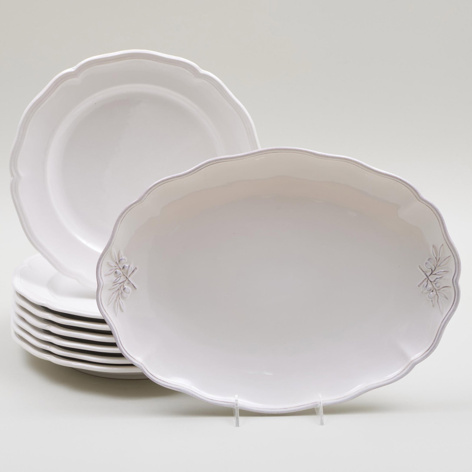 Set of Seven Loneoak White Glazed 'Queen Anne' Chargers: Set of Seven Loneoak White Glazed 'Queen Anne' Chargers Blue printed marks; together with a similar oval platter. The chargers 12 in. diam. The Mario Buatta-Designed Home of Patricia Altschul, Charles