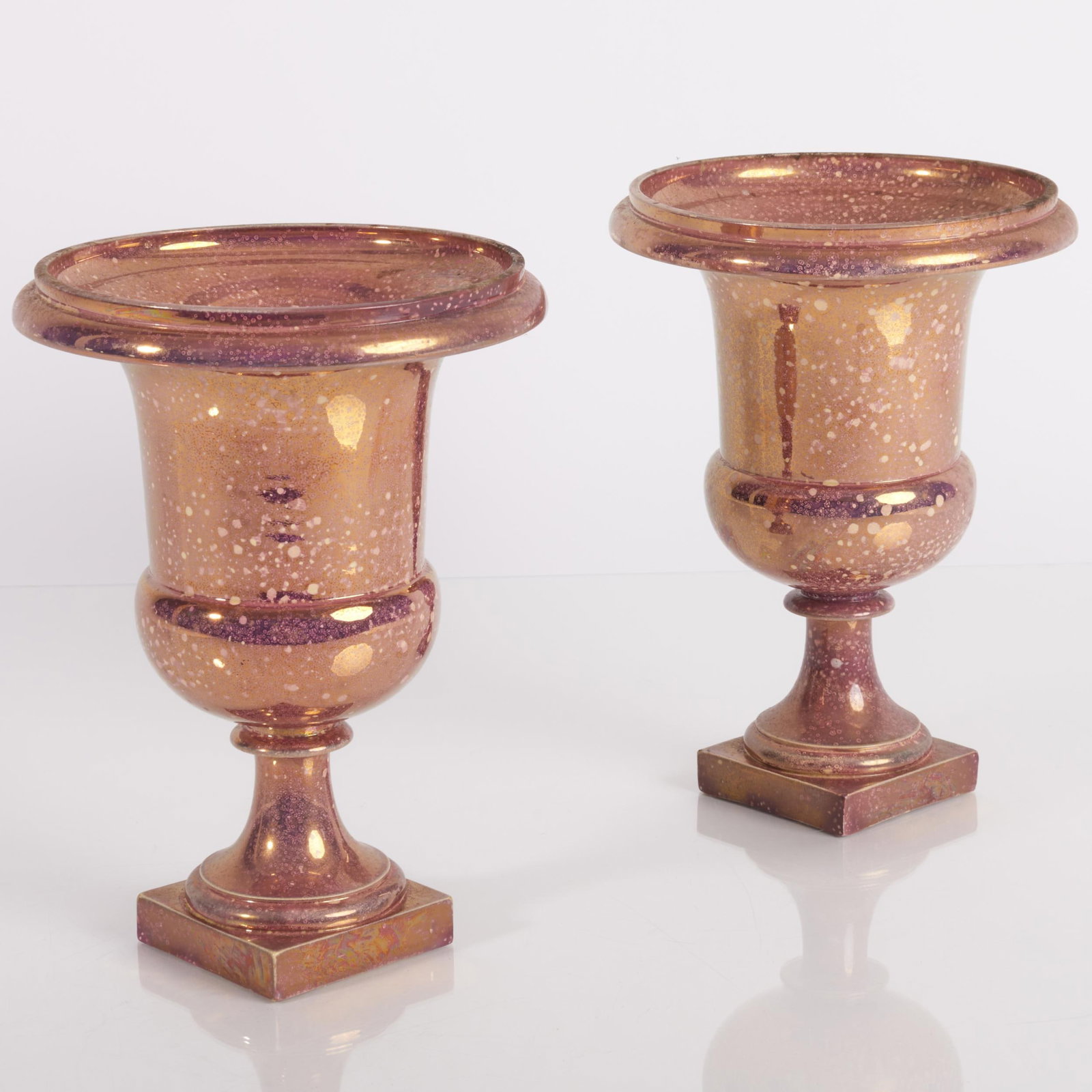 Pair of Sarreguemines Lusterware Urns: Pair of Sarreguemines Lusterware Urns . Indistinct impressed marks. 9 x 6 1/2 in. diam. The Collection of James M. Labaugh Antiques, Pound Ridge, NY.