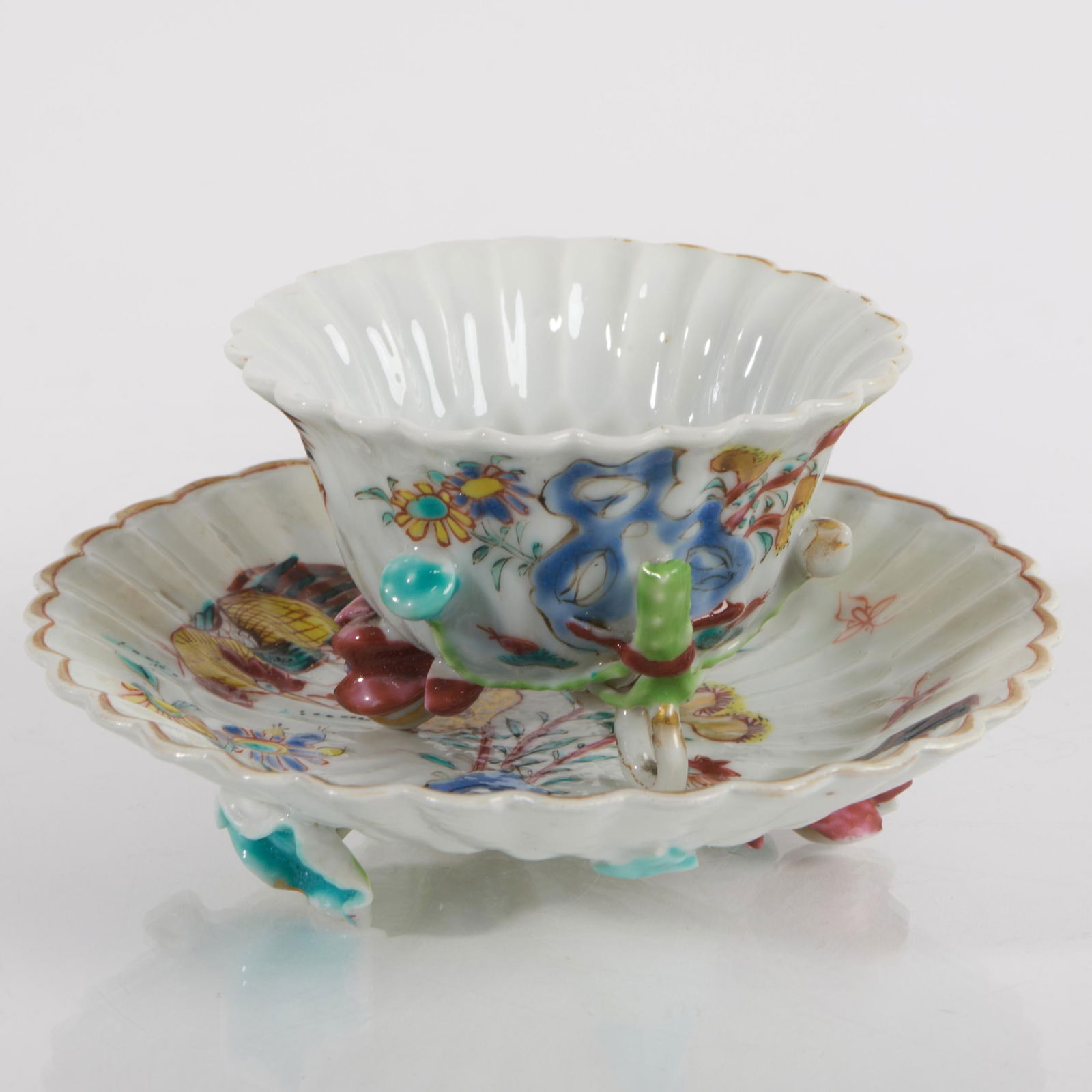 Chinese Famille Rose Porcelain Lotus Form Wine Cup and Saucer: Chinese Famille Rose Porcelain Lotus Form Wine Cup and Saucer . Unmarked. 2 3/8 x 4 1/4 in. diam. The Collection of James M. Labaugh Antiques, Pound Ridge, NY.