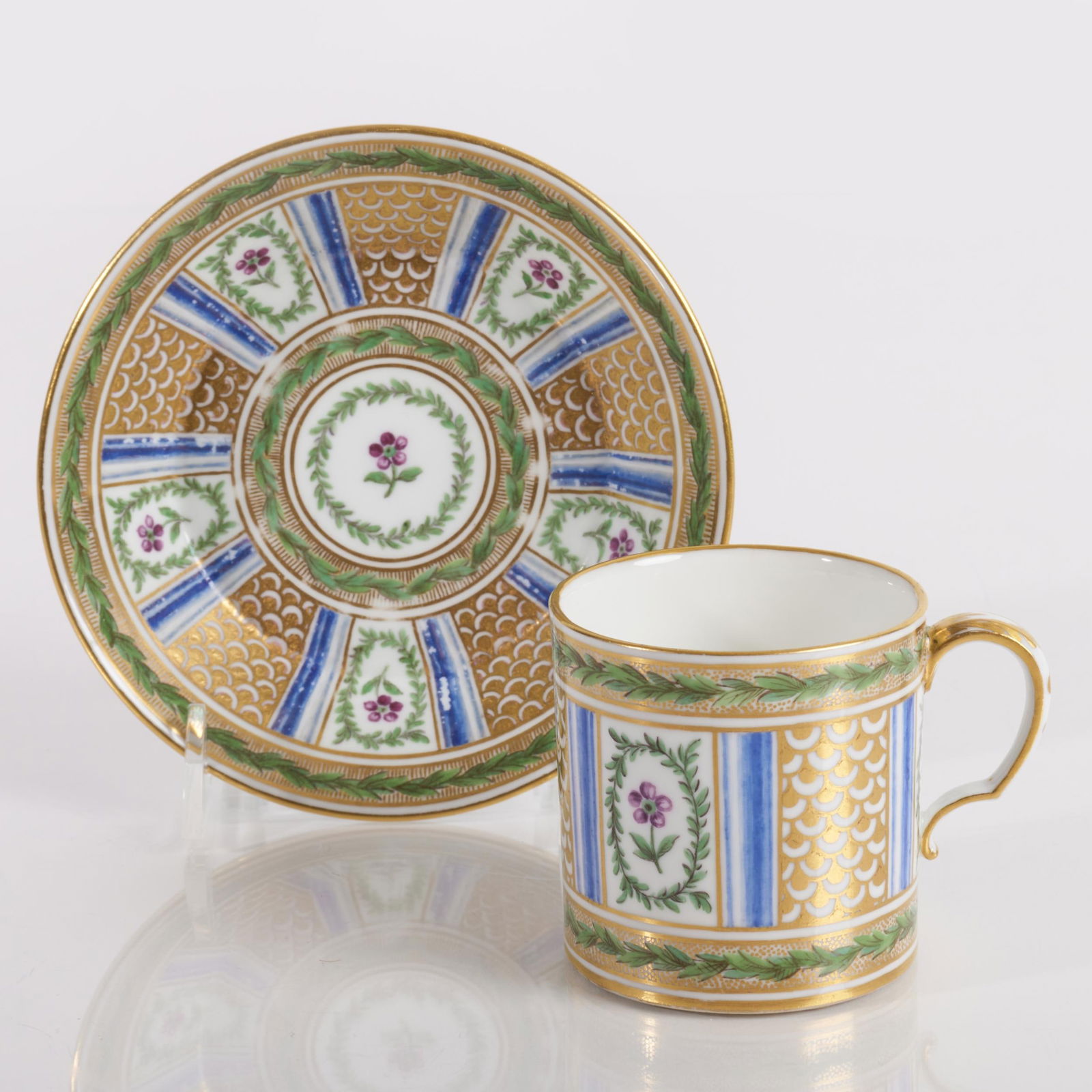 Sevres Porcelain Coffee Can and Saucer: Sevres Porcelain Coffee Can and Saucer . Painted interlacing 'L', date letter for 1778, painter's mark probably for Pierre-Antoine Mereaud. 2 3/4 x 4 7/8 in. diam. (overall). The Collection of James M
