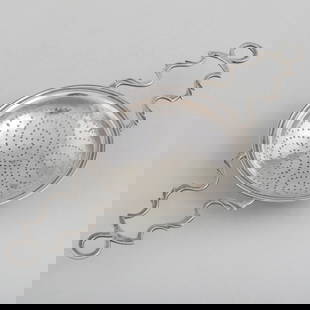 American Silver Lemon Strainer: American Silver Lemon StrainerMarked for Benjamin Burt, circa 1765; monogrammed. 4 1/2 x 11 in., 3.9 oz. approx. weight. 