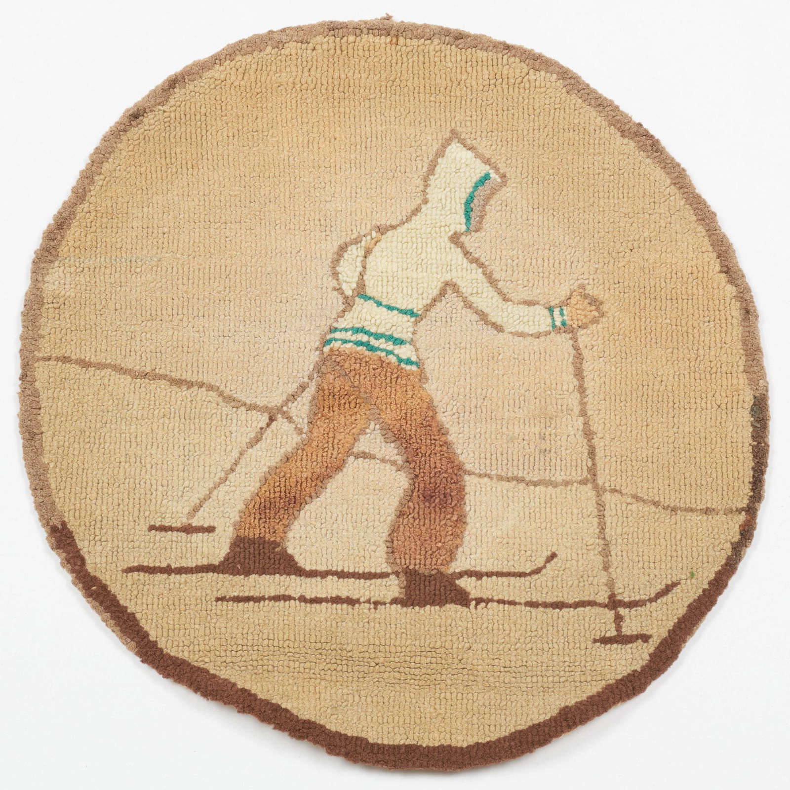 Group of Four Grenfell Hooked Trivets: Group of Four Grenfell Hooked Trivets Three with 'Grenfell Labrador Industries' label. The largest 11 3/4 in. diam. Literature: The harnessed sled dog mat. Fatovitch, Jenny G, "The Legend of Grenfell: