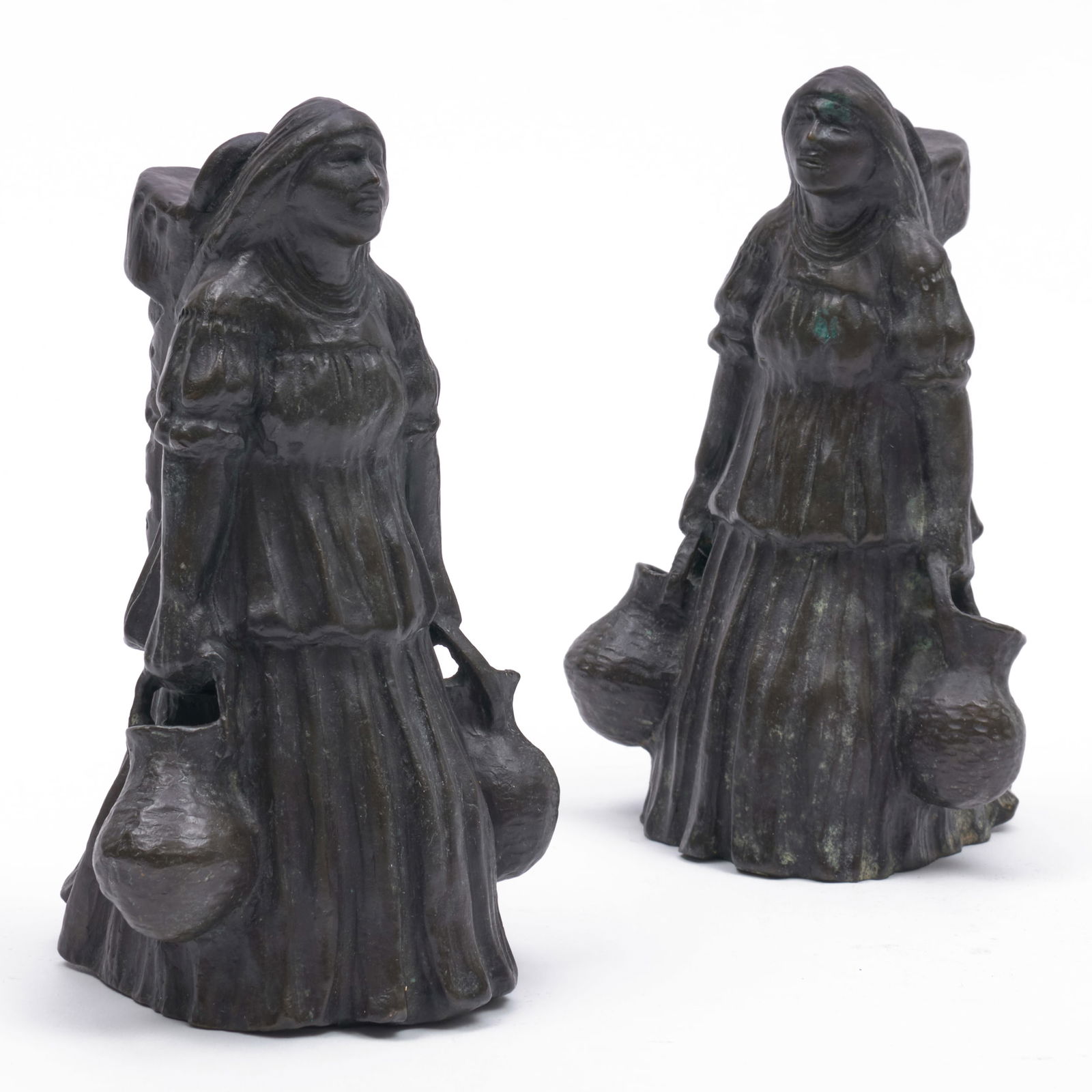 Allan Houser (1914-1994): Figure Carrying Water: A Pair: Allan Houser (1914-1994): Figure Carrying Water: A Pair Two bronze, both signed 'A. Houser' and with the SF foundry mark on the underside, numbered 17.24 and 19.24. Both 6 1/2 in. high. The Collection