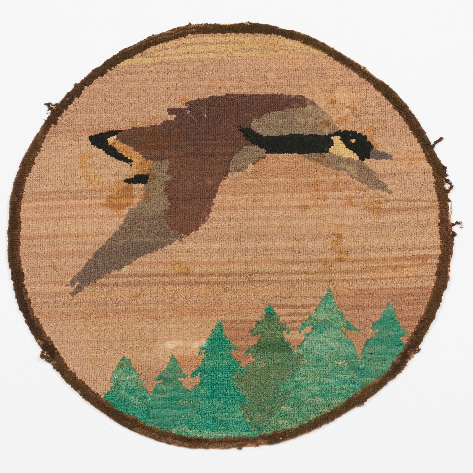 Group of Seven Grenfell Hooked Trivets with Polar Bears and Birds: Group of Seven Grenfell Hooked Trivets with Polar Bears and Birds Six of the seven with 'Grenfell Labrador Industries' label. The largest 16 in. diam. Literature: The polar bear on the all white ice f