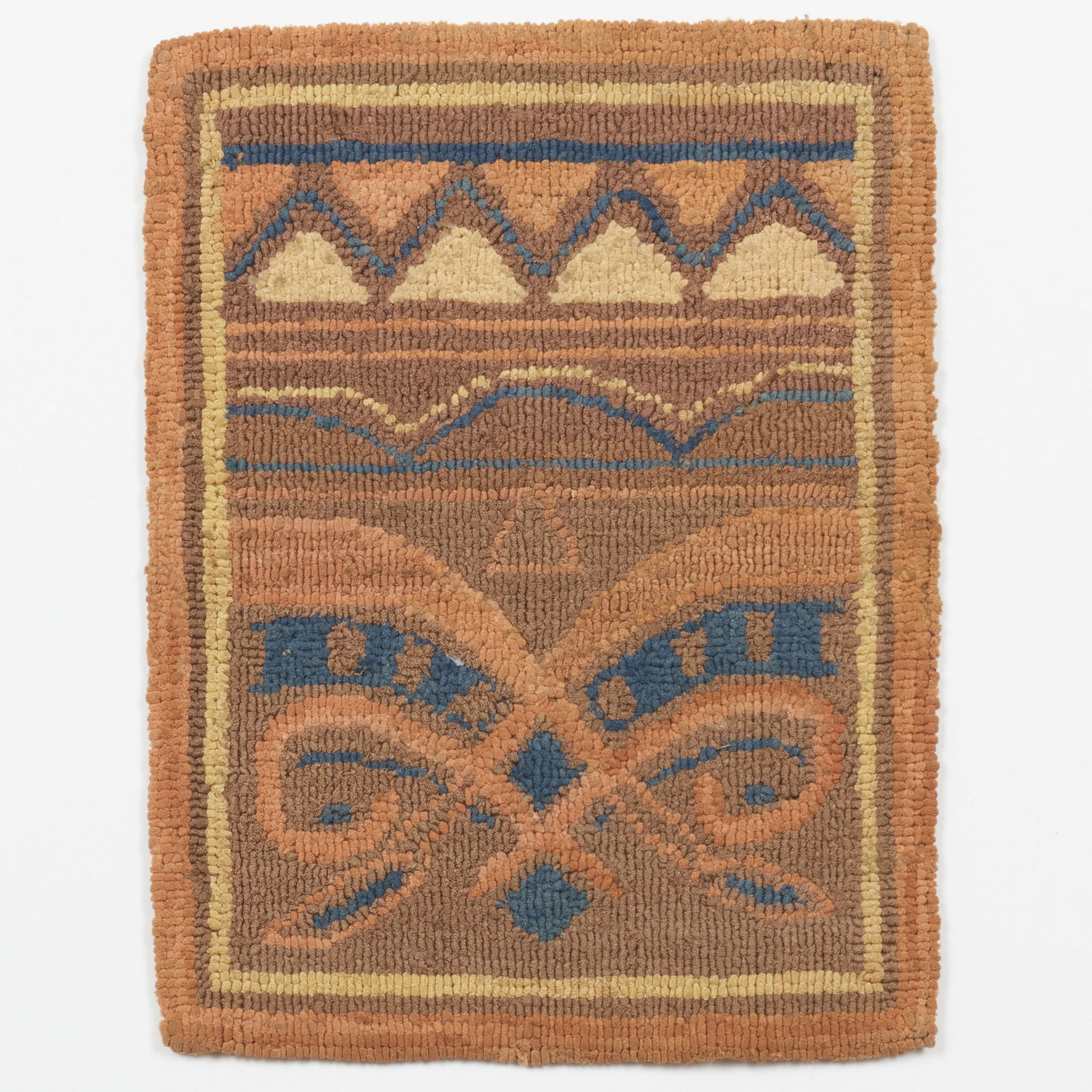 Group of Four Small Canadian Hooked Trivets: Group of Four Small Canadian Hooked Trivets The geometric and octagonal mats with 'Grenfell Labrador Industires' label; the village scene with 'Manoir Richelieu' label. Comprising: A mat depicting an