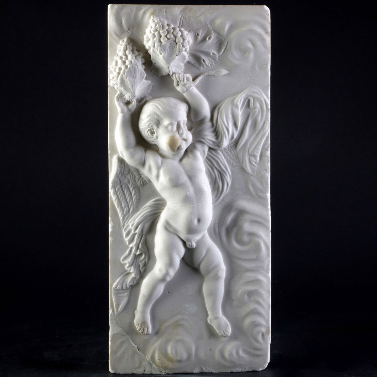 White Marble Chimneypiece Tablet with Infant Bacchus: White Marble Chimneypiece Tablet with Infant Bacchus 8 x 18 1/2 in. Sold Sotheby's, London, May 22, 2007, Lot 49. The Collection of Aso O. Tavitian - New York & Stockbridge.