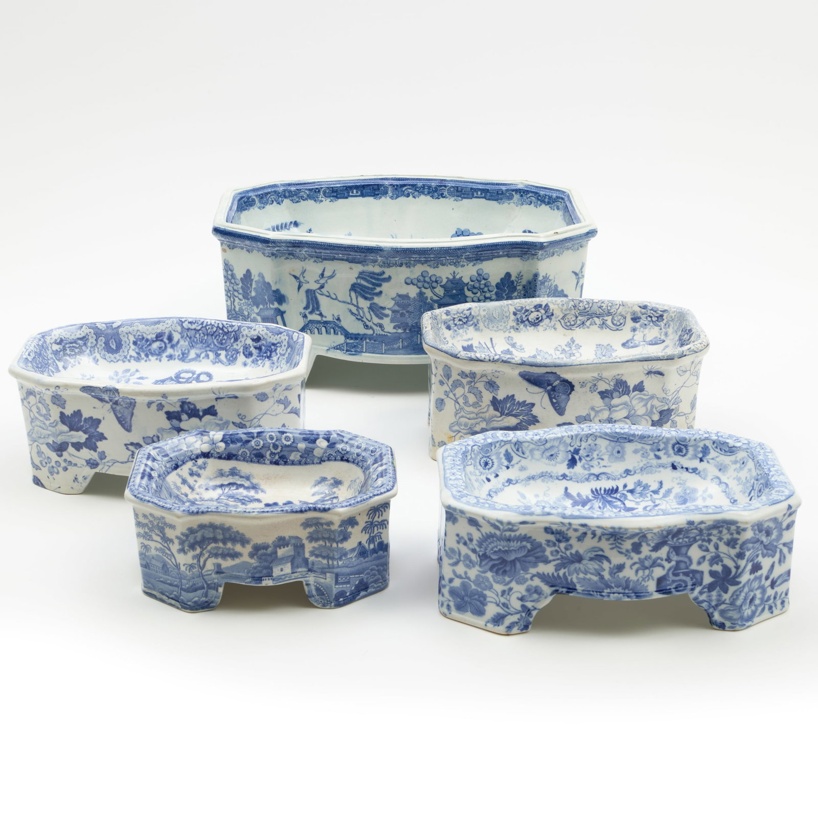 Five English Blue and White Transfer Printed Dog Bowls: Five English Blue and White Transfer Printed Dog Bowls One marked Copeland, another Mintons and three unmarked. The largest 6 x 13 3/4 x 10 1/8 in. Property from the Jordan Saunders Collection
