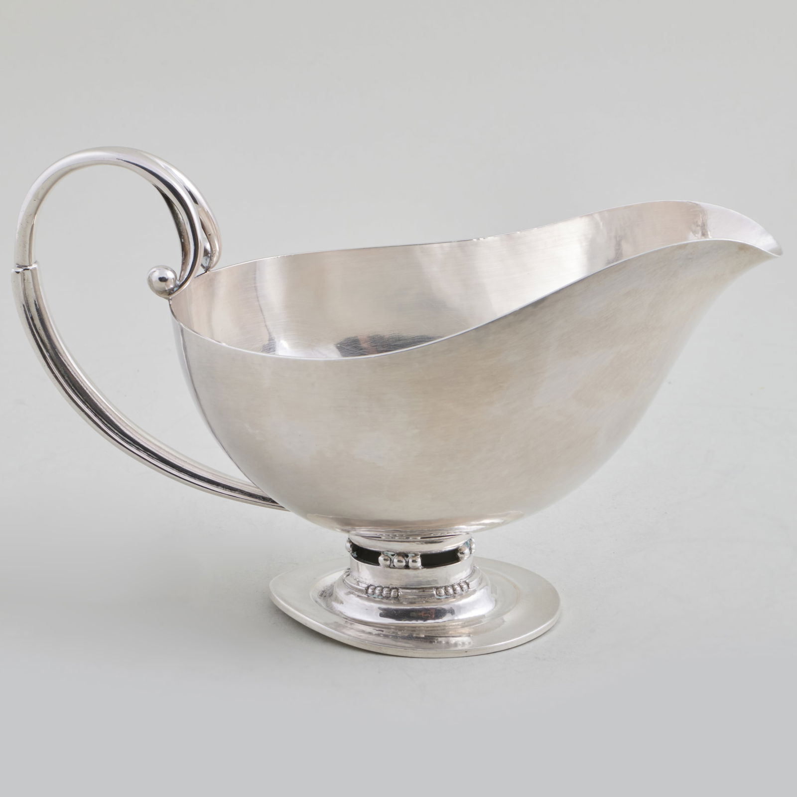 Johan Rohde for Georg Jensen Silver Sauce Boat: Johan Rohde for Georg Jensen Silver Sauce Boat Marked 'Sterling'. 5 x 8 1/2 x 4 in., 14.5 oz. approx. weight.