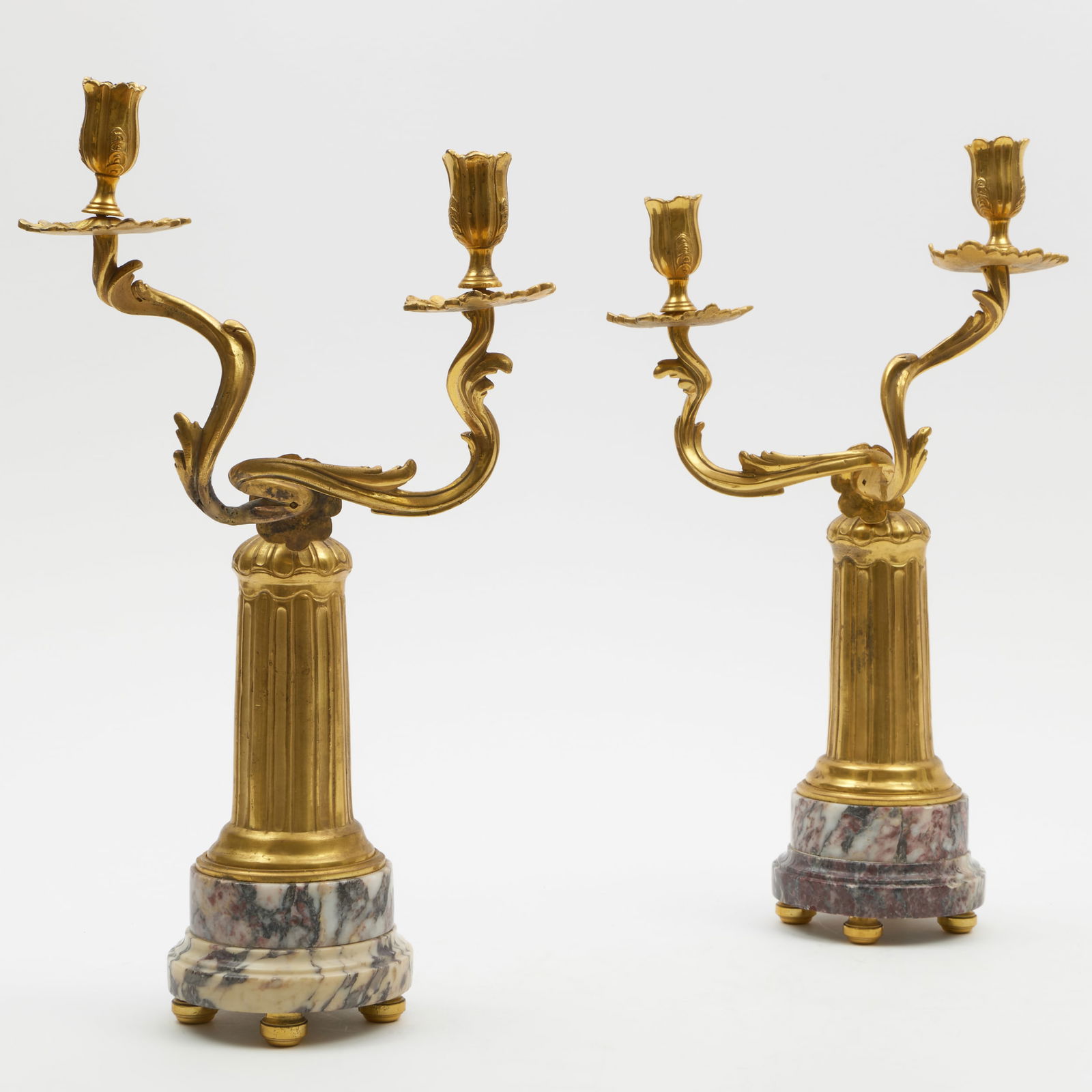 Pair of Continental Ormolu and Marble Two-Light Candelabra: Pair of Continental Ormolu and Marble Two-Light Candelabra 18 1/4 x 10 1/8 x 9 3/4 in. Sold Butterfield, San Francisco, The Estate of Michael Taylor, April 7, 1987, Lot 84. The Collection of Carole Ha