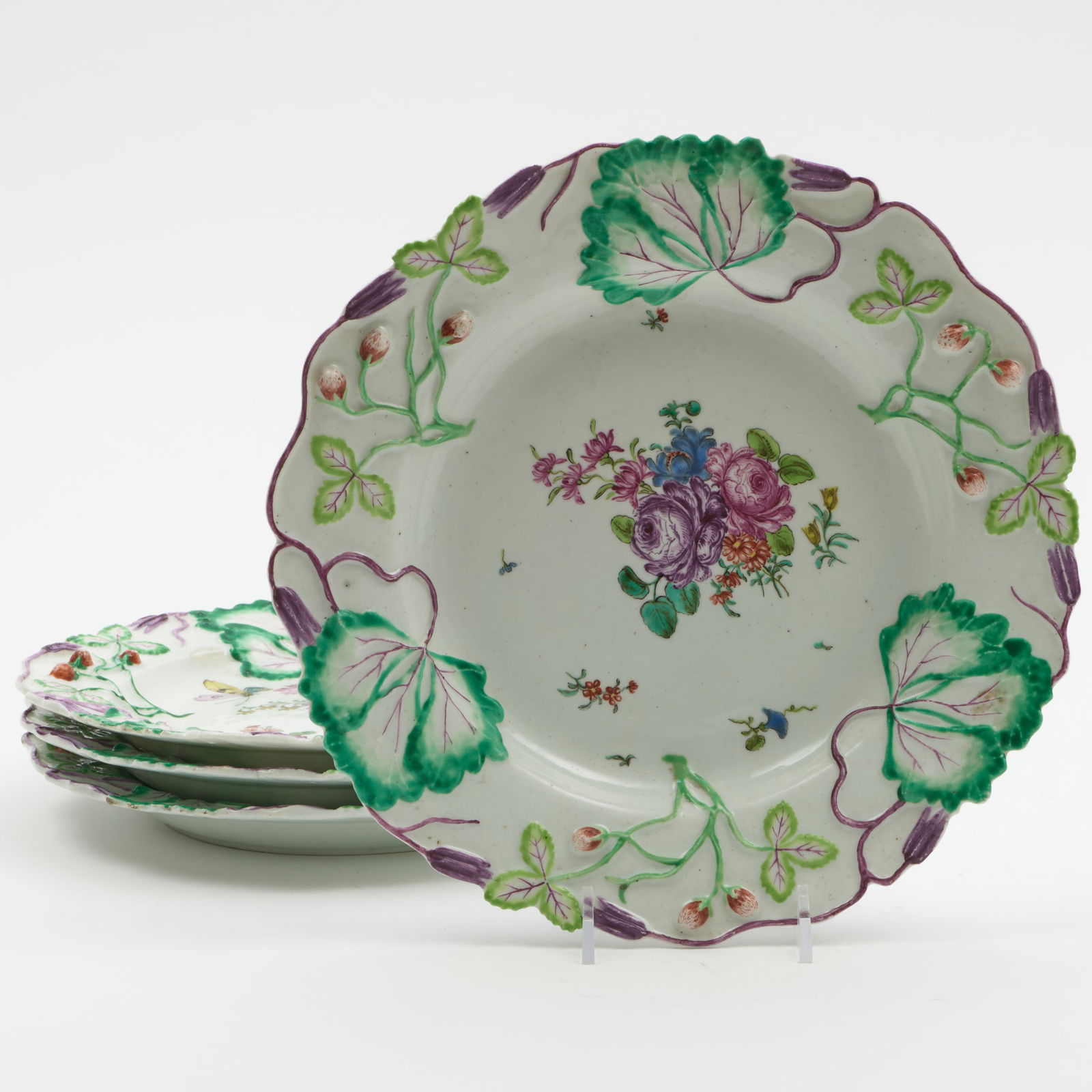 Four Longton Hall Porcelain 'Strawberry Leaf' Plates: Four Longton Hall Porcelain 'Strawberry Leaf' Plates Unmarked. 9 in. diam. Sold Sotheby's, New York, Property from the Collection of Mary Sayles Booker Braga, October 19, 2015, Lot 283. The Collection