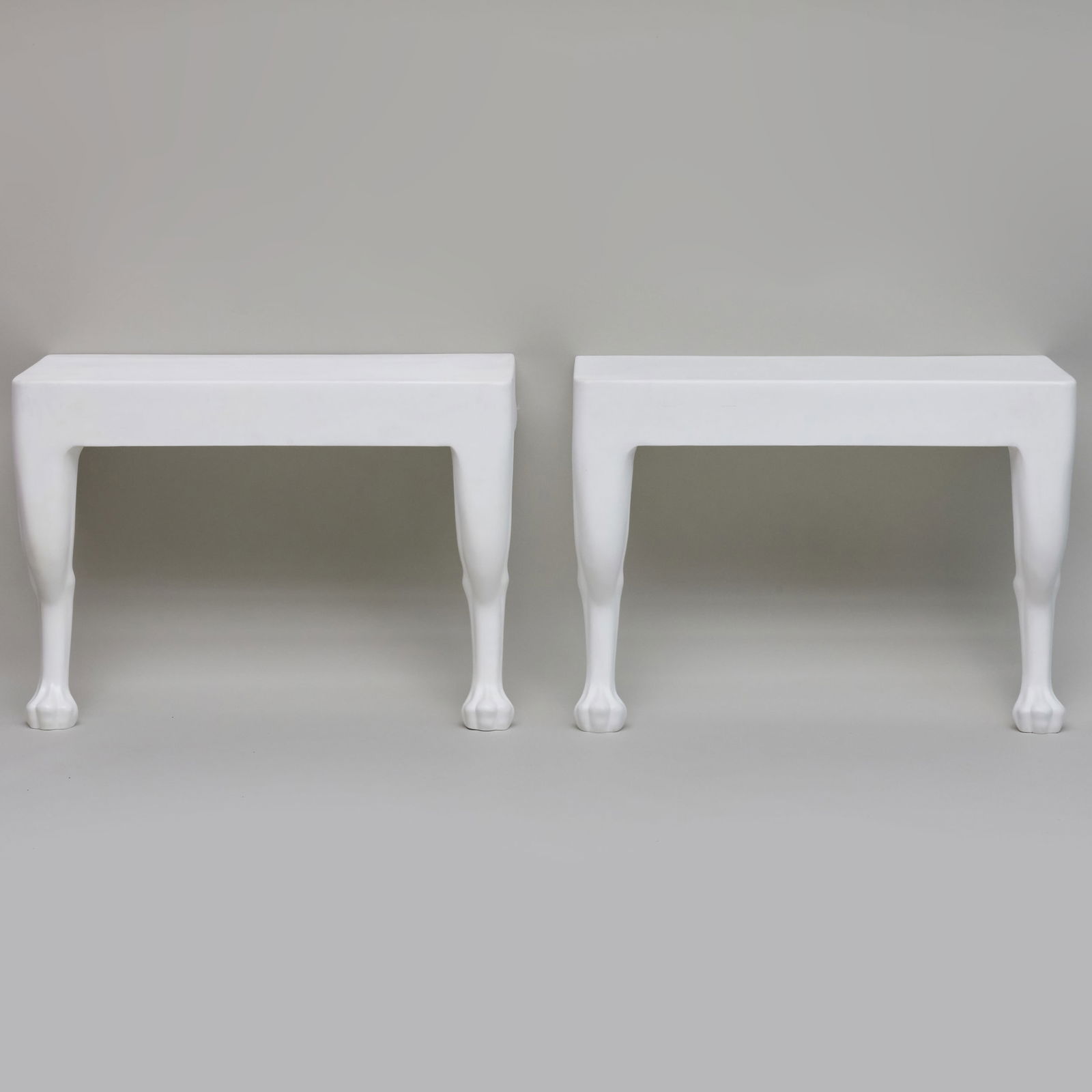 Pair of John Dickinson White Faux Plaster Consoles, for Sutherland: Pair of John Dickinson White Faux Plaster Consoles, for Sutherland Cast in glass fiber reinforced concrete from the models of John Dickinson, manufactured by Sutherland, inscribed 'John Dickinson/SUTH