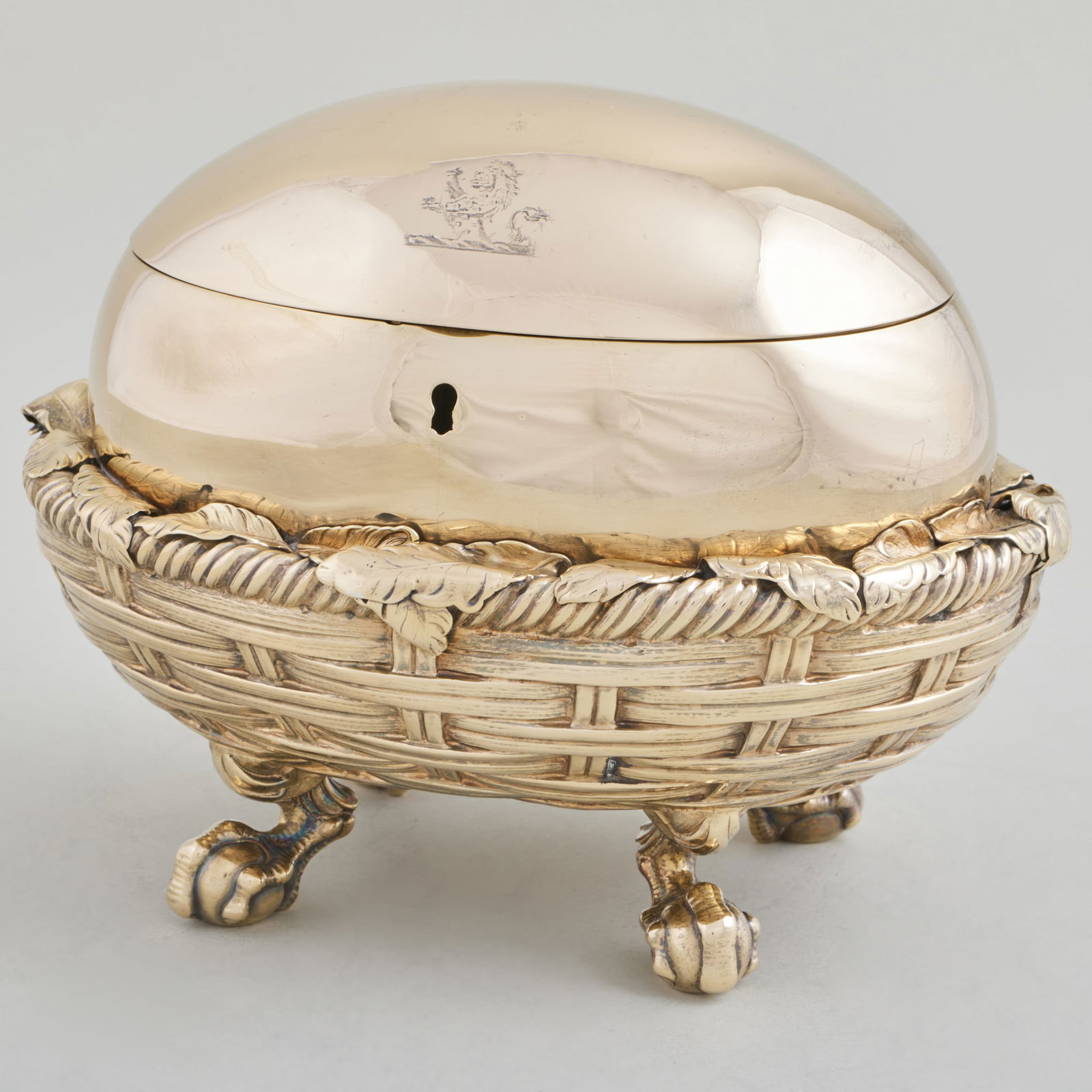 Victorian Silver-Gilt Egg Form Double Tea Caddy: Victorian Silver-Gilt Egg Form Double Tea Caddy Mark of George Fox, London, 1864; engraved with crest. 6 1/4 x 7 1/2 x 5 in., 30.5 oz. approx. gross weight. Sold Sotheby's New York, October 22, 2002,