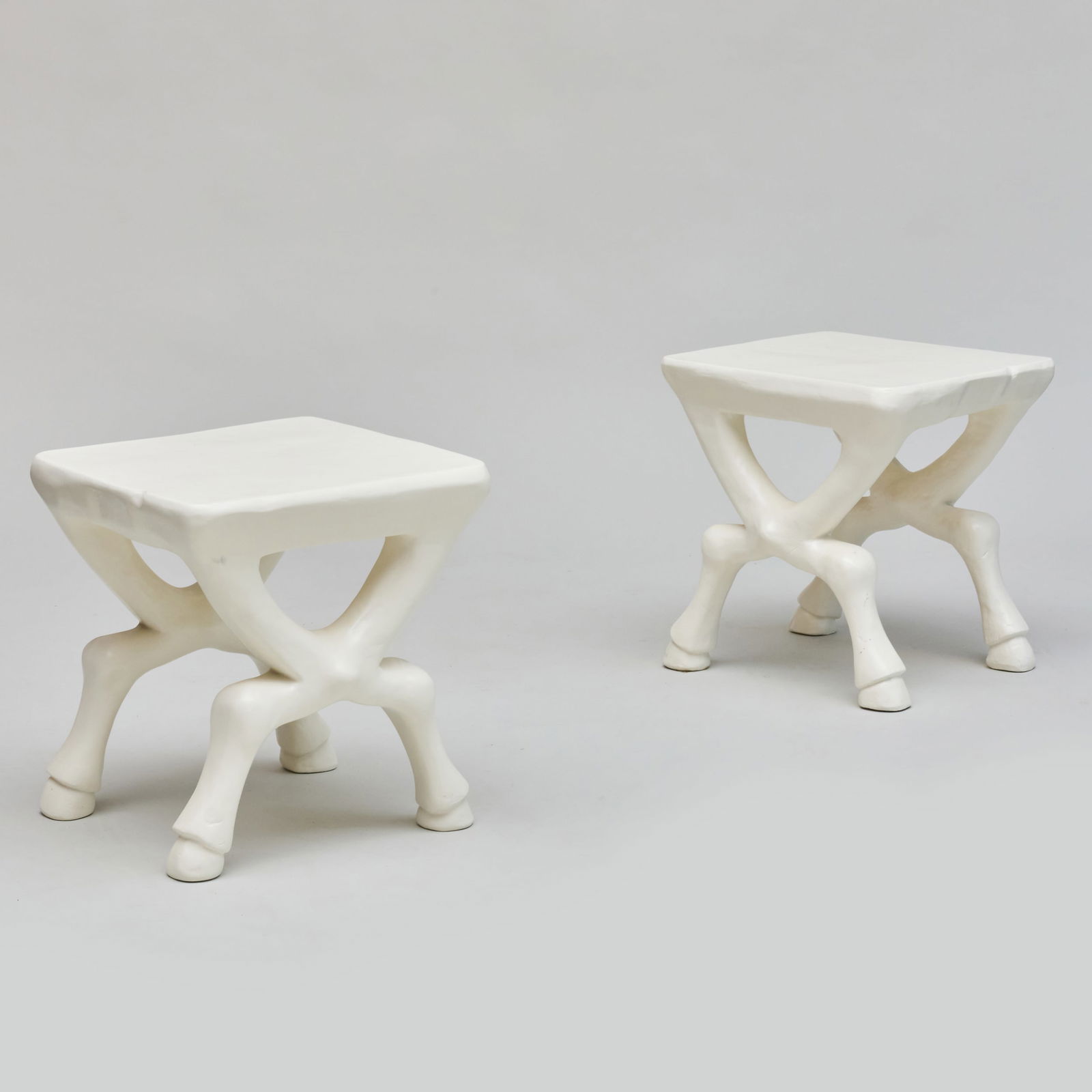Pair of John Dickinson White Faux Plaster Hoofed Tables, for Sutherland: Pair of John Dickinson White Faux Plaster Hoofed Tables, for Sutherland Cast in glass fiber reinforced concrete from the models of John Dickinson, manufactured by Sutherland, inscribed 'John Dickinson