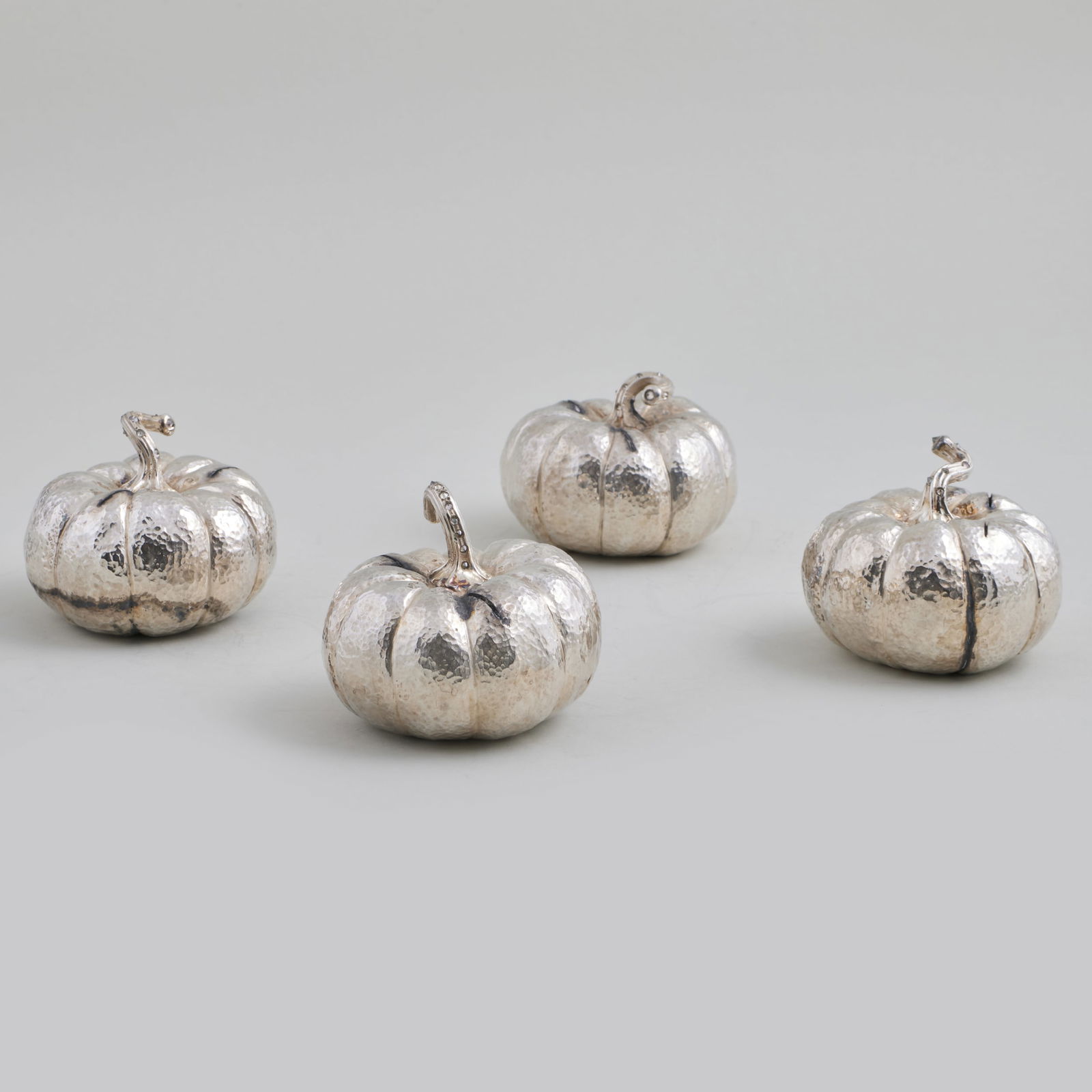 Set of Four Paolo Costagli Diamond Inset Silver Pumpkin Form Place Card Holders: Set of Four Paolo Costagli Diamond Inset Silver Pumpkin Form Place Card Holders Apparently unmarked. 2 x 3 in. diam., 35 oz. approx. gross weight. Sold Christie's, New York, March 7, 2006, Lot 189. Th