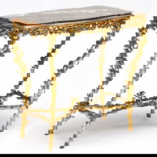 Continental Giltwood Faux Bois Center Table with an Inset Marble Top: Continental Giltwood Faux Bois Center Table with an Inset Marble Top 37 x 31 x 20 in. The Collection of Carole Harris.