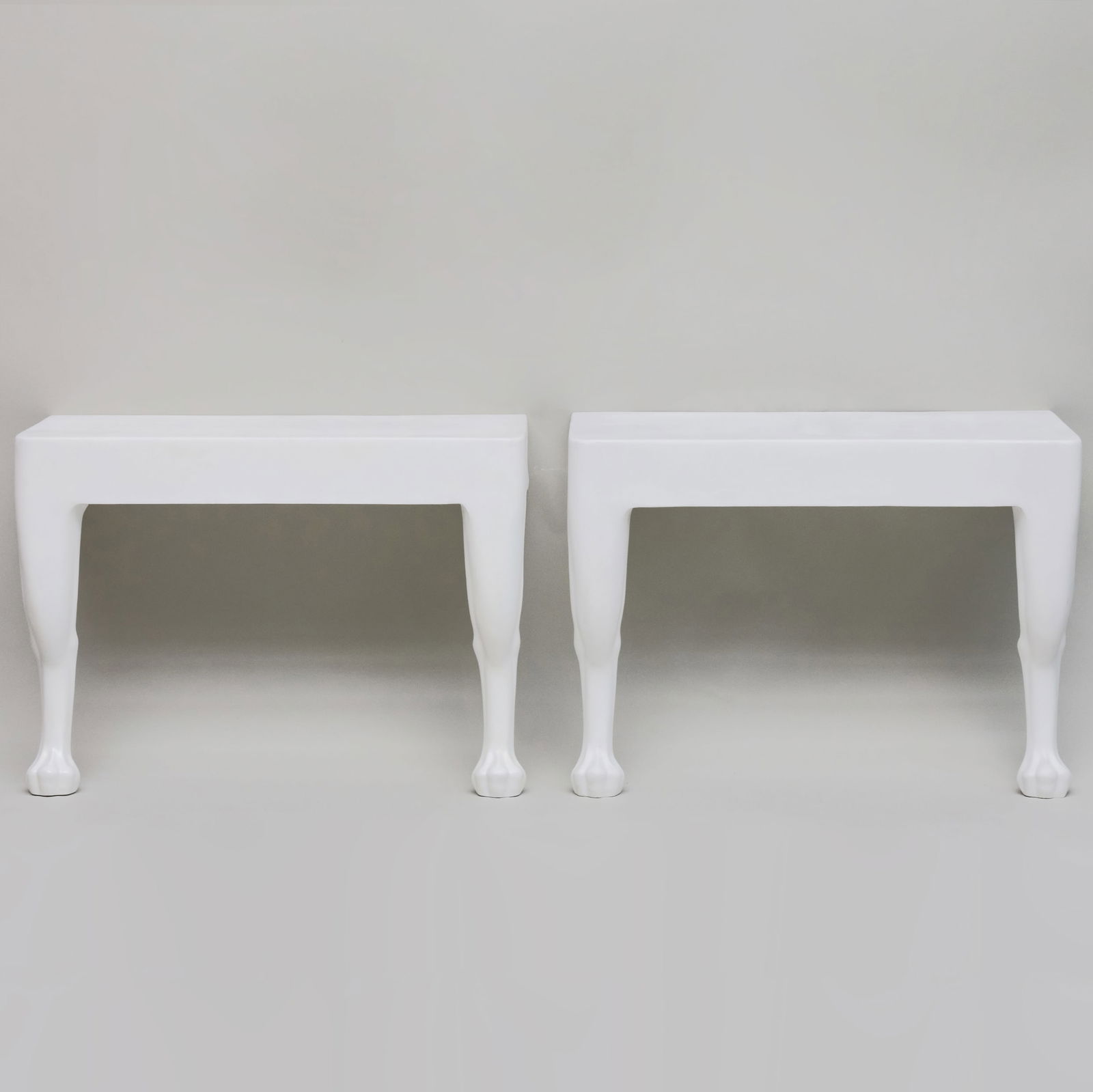 Pair of John Dickinson White Faux Plaster Console Tables, for Sutherland: Pair of John Dickinson White Faux Plaster Console Tables, for Sutherland Label. Cast in glass fiber reinforced concrete from the models of John Dickinson, manufactured by Sutherland, inscribed 'John D