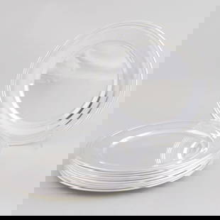 Set of Eleven S. Kirk & Son Silver Bread Plates: Set of Eleven S. Kirk & Son Silver Bread Plates Marked 'Sterling'. 6 in. diam., 35 oz. approx. weight. Anne H. Bass Collection.