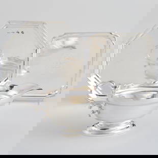 George I Silver Waiter, a George II Sauceboat and a Silver Waiter: George I Silver Waiter, a George II Sauceboat and a Silver Waiter The first octagonal waiter marked London, 1718, maker's mark indistinct; the sauce boat with crest, mark of John Eckfourd, London, 172