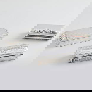 Three Continental Silver Snuff Boxes: Three Continental Silver Snuff Boxes Comprising: A box with applied thumbpiece, indistinctly marked, possibly Vienna A box with fluted design, indistinctly marked, possibly Vienna A box with a coffere