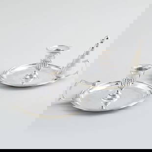 Pair of George III Silver Chambersticks: Pair of George III Silver Chambersticks The chambersticks mark of Richard Cook, London, 1802; engraved with crest; together with an English snuffer,, indistinctly marked, engraved with crest. 2 1/4 x