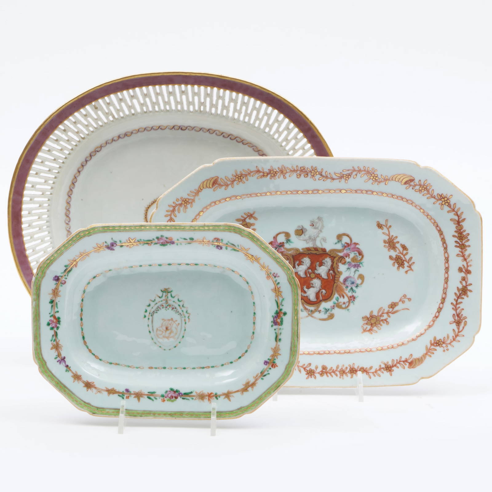 Two Chinese Export Small Oval Porcelain Armorial Dishes with Canted Corners