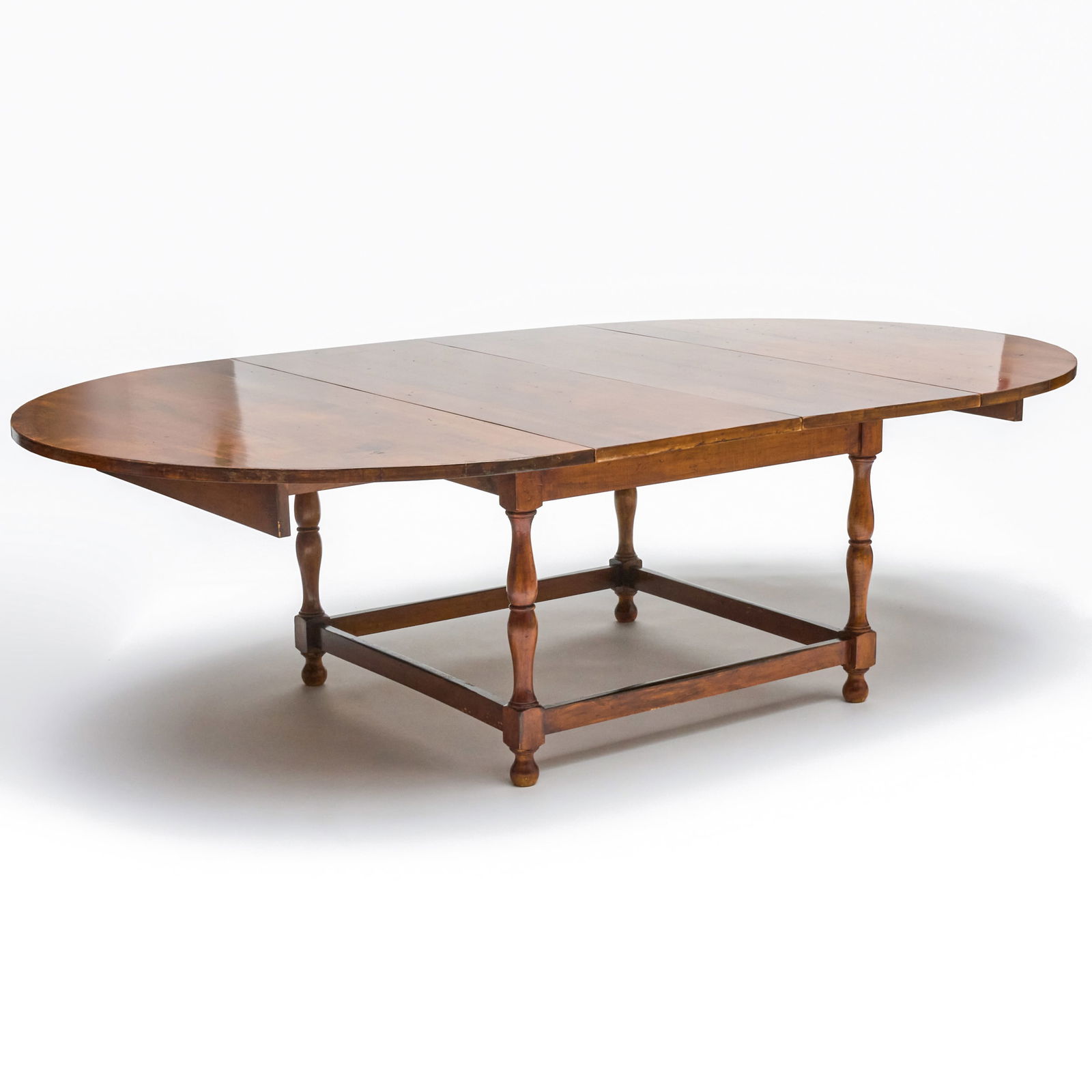 Federal Style Maple and Tiger Maple Dining Table: Federal Style Maple and Tiger Maple Dining Table Fitted with two leaves. Without leaves, 29 1/2 x 5 ft. diam. With leaves, 29 ½ in. x 8 ft. 3 ½ in. diam.