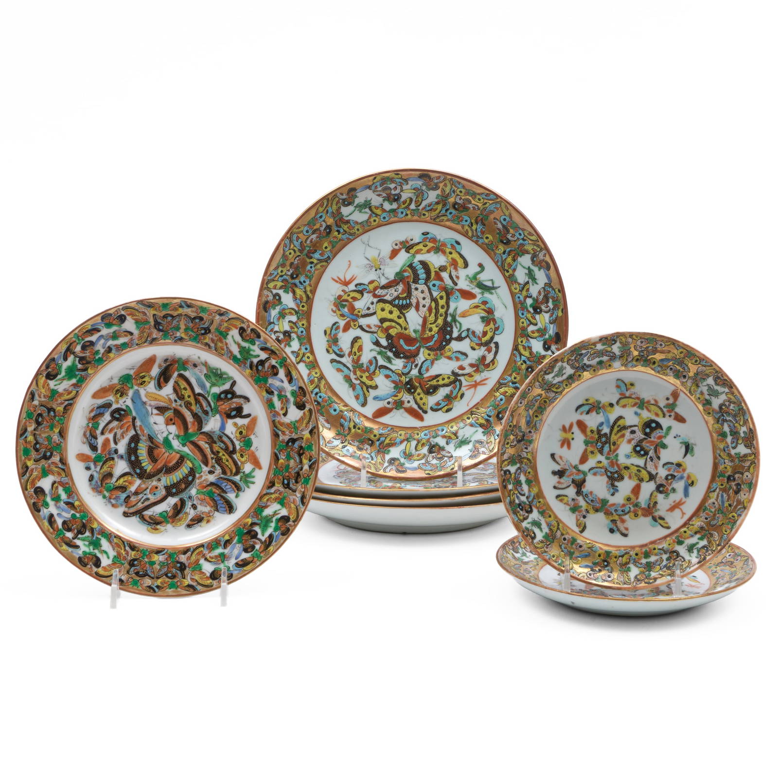 Group of Seven Chinese Export Porcelain Plates Decorated with Butterflies