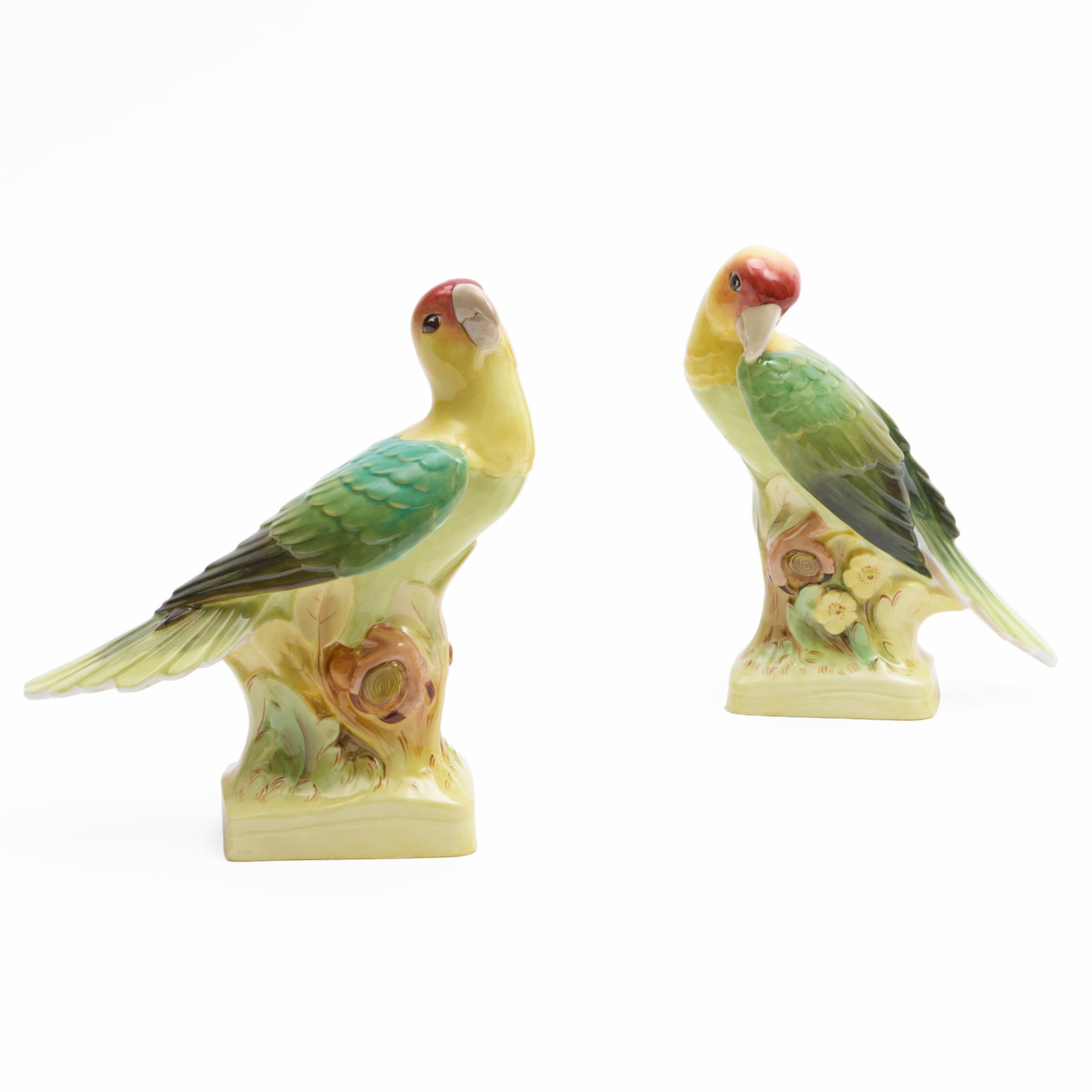 Pair of H. Palliser and Arthur Dale Holland for Wedgwood Porcelain Models of Parroquets: Pair of H. Palliser and Arthur Dale Holland for Wedgwood Porcelain Models of Parroquets Brown printed mark. 7 3/4 x 7 x 3 1/4 in.