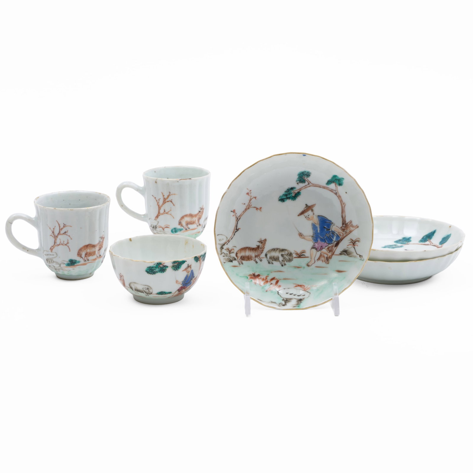 Chinese Export Porcelain Trio with Shepherding Scenes: Chinese Export Porcelain Trio with Shepherding Scenes Unmarked. Comprising: A pair of coffee cups A teabowl Three saucers The coffee cups 2 1/2 x 2 3/8 in. diam., the teabowl 1 1/2 x 2 7/8 in. diam., 