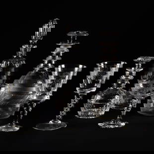 Assembled Etched and Cut Glass Drinkware Service: Assembled Etched and Cut Glass Drinkware Service Comprising: Six small etched wine glasses with air twist stem A pair of crown and 'G III' etched wine glasses Nineteen etched coupes with 'B' monogram