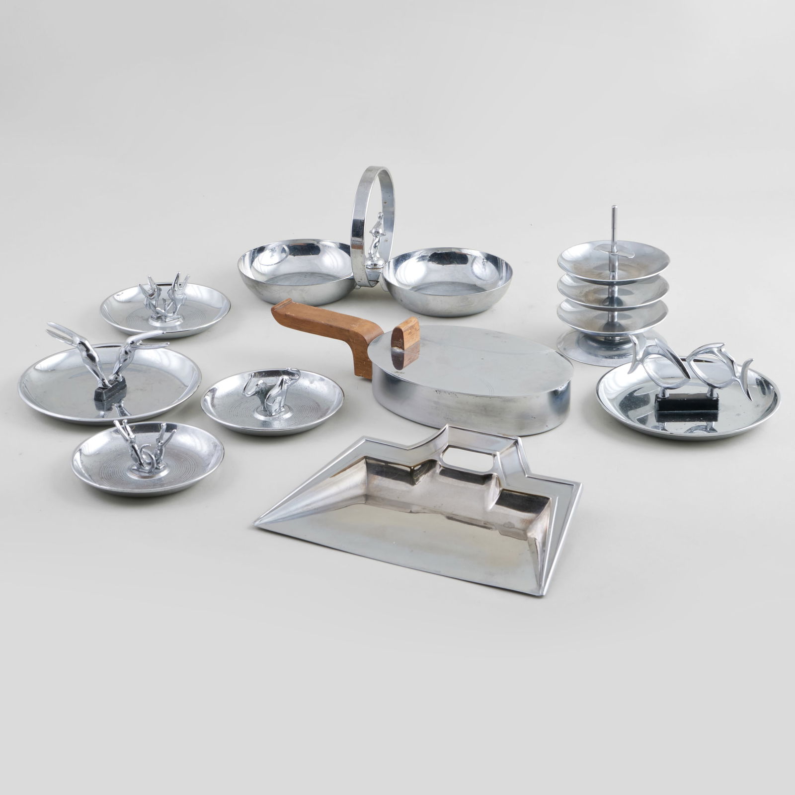 Group of Metal Vide Poches and Table Accessories: Group of Metal Vide Poches and Table Accessories Comprising: Six similar vide poches with various animals in three sizes, stamped marks Two double vide poches with over handle in two sizes and styles,