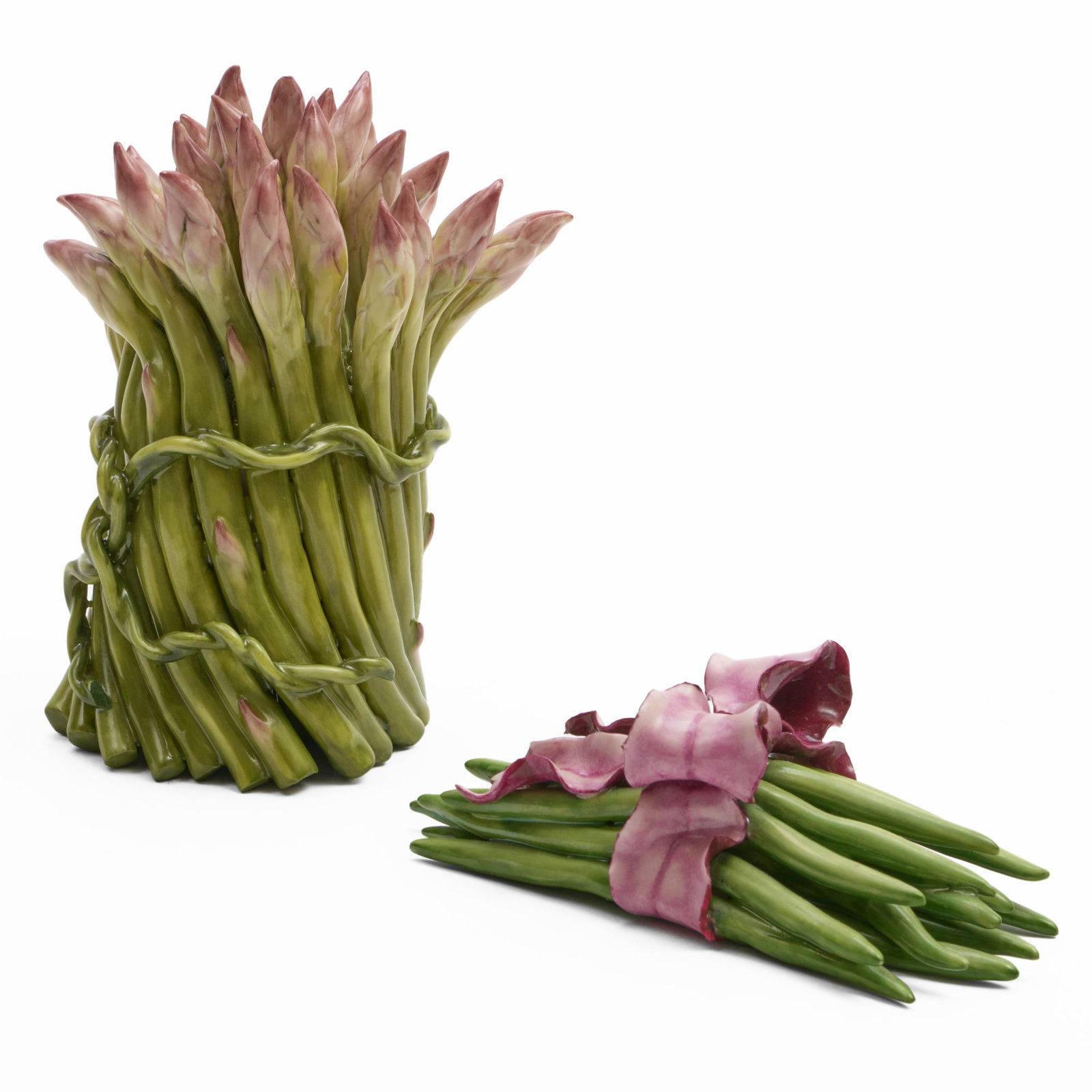 Two Katherine Houston Porcelain Models of Vegetables: Two Katherine Houston Porcelain Models of Vegetables Painted monogram mark. Comprising: A bunch of asparagus A bunch of green beans The asparagus 7 1/4 x 4 1/2 in. diam., the beans 2 1/4 x 7 x 2 3/4 i