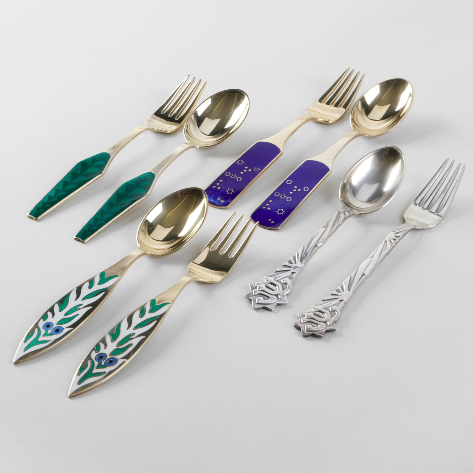Set of Six Jensen Silver and Enamel Commemorative Holiday Forks and Spoons: Set of Six Jensen Silver and Enamel Commemorative Holiday Forks and Spoons Comprising: 1964 'Orion' spoon and fork, designed by Inger Hanmann, mark of A. Michelsen and 'Sterling' 1970 'Mr. Snowman's C