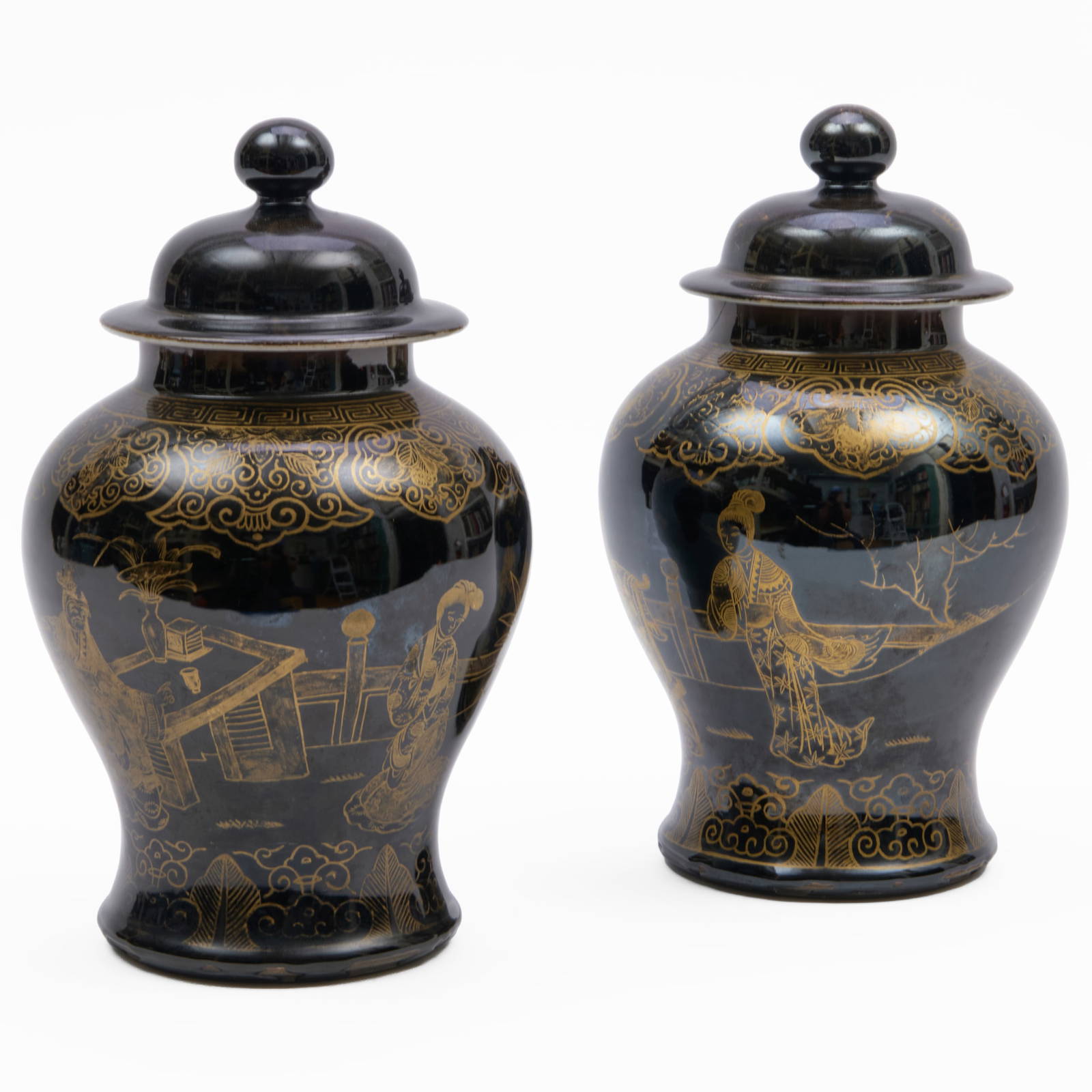 Pair of Black Ground and Gilt Porcelain Baluster Jars and Covers with Figures