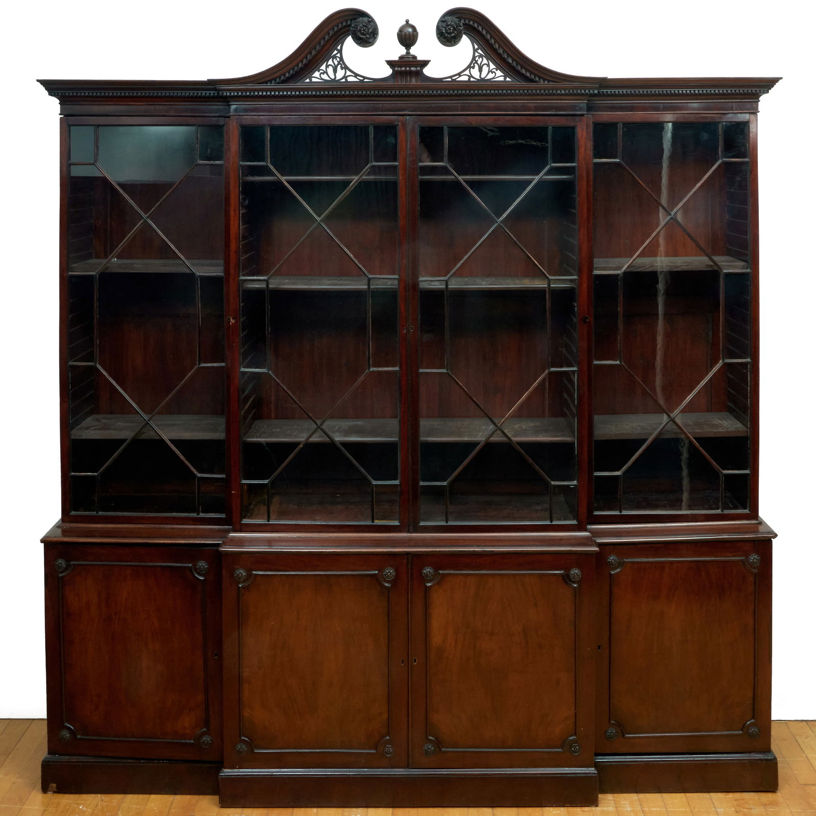 George III Carved Mahogany Breakfront Bookcase, In the Manner of Thomas Chippendale: George III Carved Mahogany Breakfront Bookcase, In the Manner of Thomas Chippendale 8 ft. 2 in. x 7 ft. 9 in. x 21 in. The Chinese Porcelain Company.