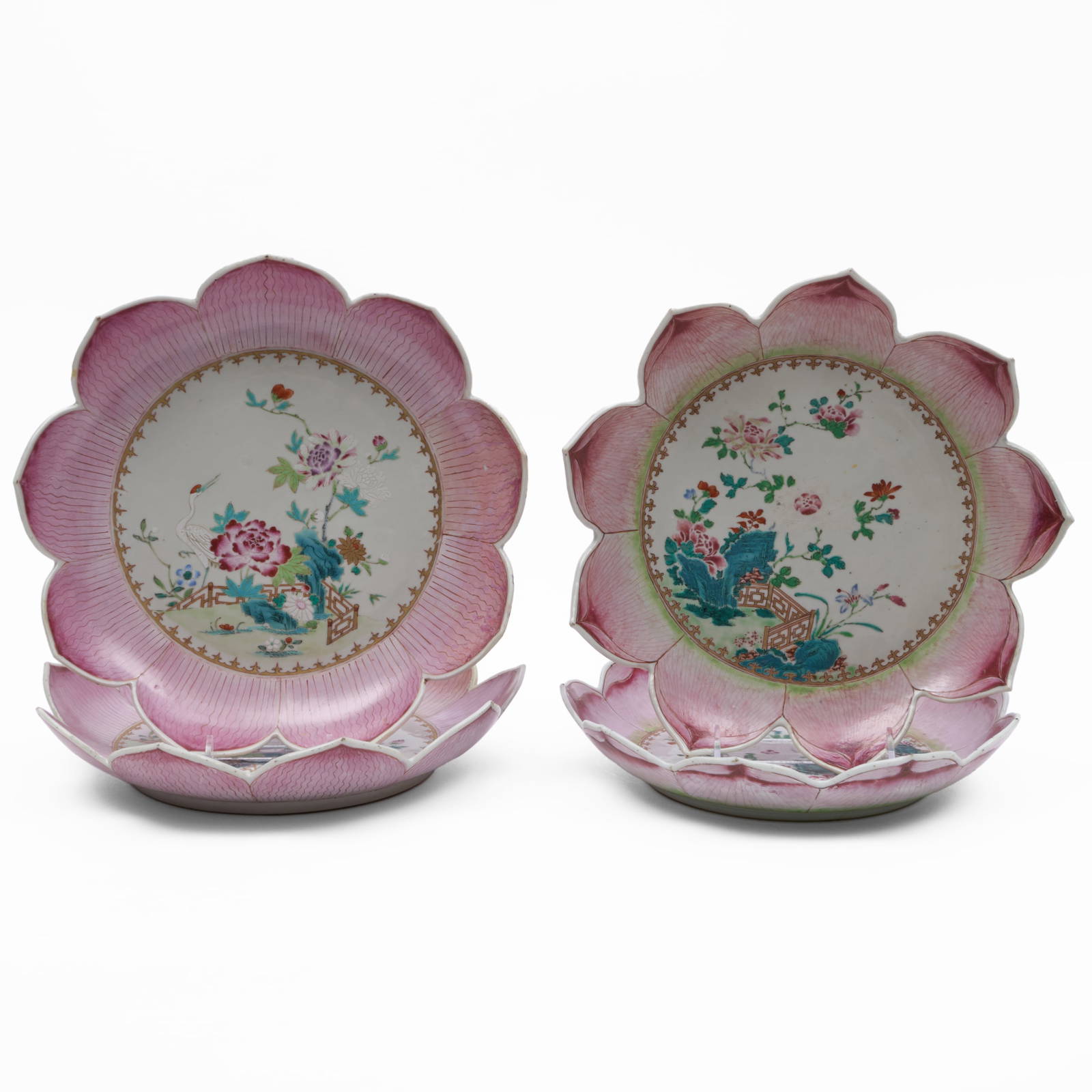 Two Near Pairs of Chinese Export Famille Rose Porcelain 'Lotus' Pattern Plates