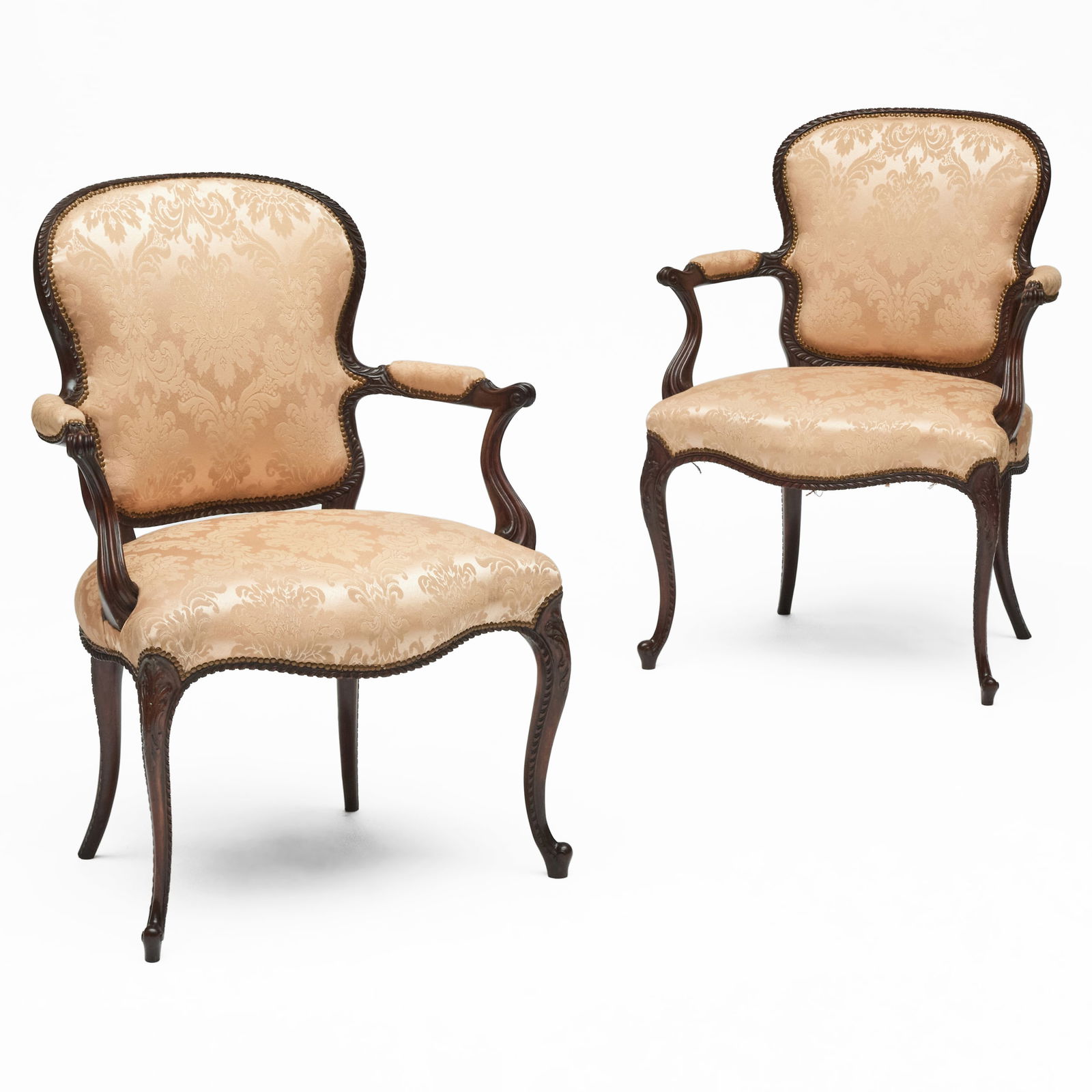 Pair of Edwardian Carved Mahogany Armchairs, in the Manner of John Cobb: Pair of Edwardian Carved Mahogany Armchairs, in the Manner of John Cobb Upholstered in silk damask. 37 x 28 x 24 in. Seat height 19 in. HydeParkAntiquesatSTAIR