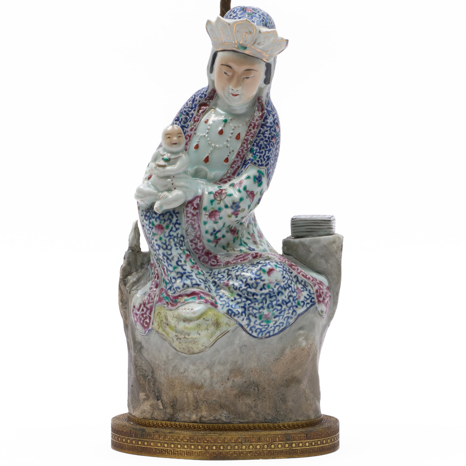 Chinese Famille Rose Porcelain Figure of Guanyin Mounted as a Lamp: Chinese Famille Rose Porcelain Figure of Guanyin Mounted as a Lamp The figure 13 1/4 x 7 x 5 in., 20 x 6 3/4 x 5 1/4 in. (to socket). The Collection of James M. Labaugh Antiques, Pound Ridge, NY.