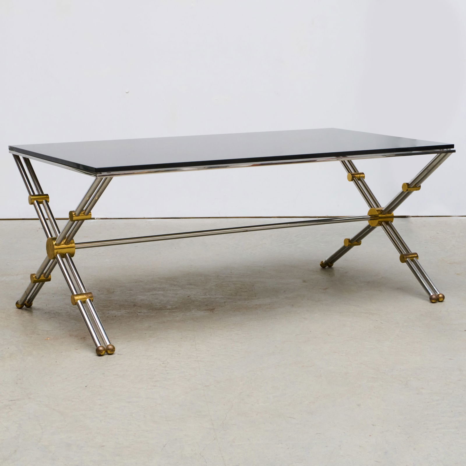 John Vesey Steel, Stainless Steel, and Brass Table with Smoked Glass Top: John Vesey Steel, Stainless Steel, and Brass Table with Smoked Glass Top 28 x 5 ft. 6 x 36 in.