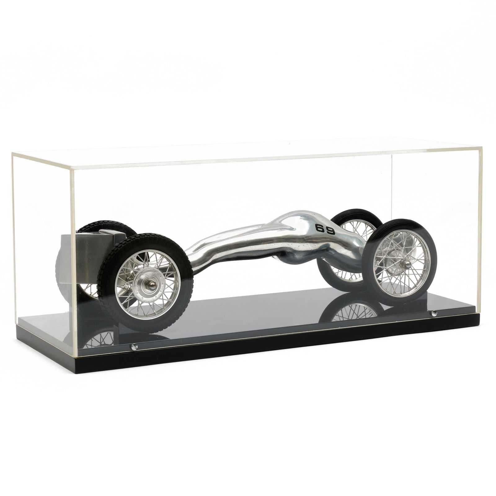 Ernest Trova (1927-2009): Study, from Falling Man Series: Ernest Trova (1927-2009): Study, from Falling Man Series Chromium on miniature automobile chassis in a plexiglass case, 1964, unmarked. 3 3/8 x 14 x 5 3/8 in., 6 7/8 x 15 3/4 x 6 1/8 in. (case). Exhib