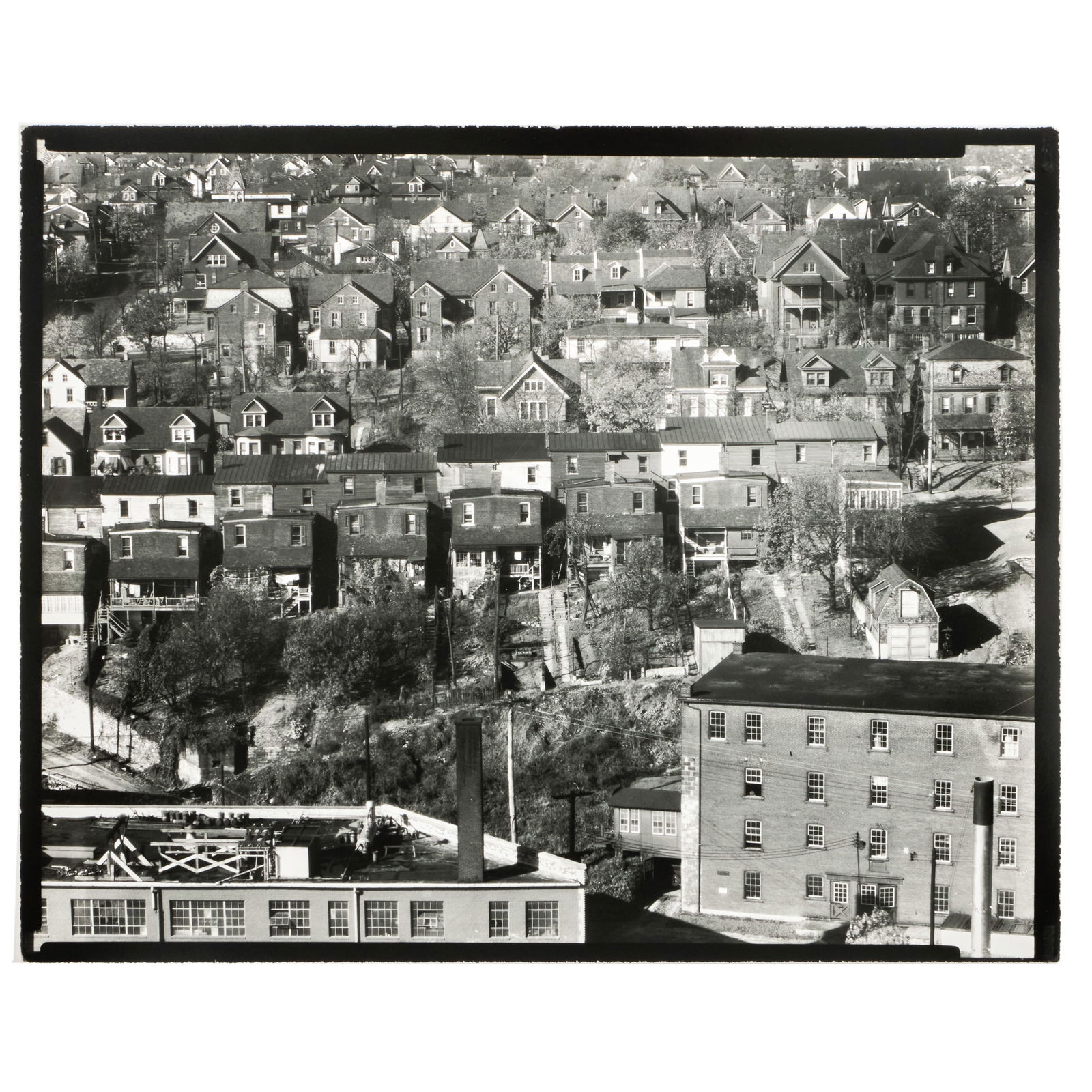 Walker Evans (1903-1975): Houses, Bethlehem, Pennsylvania: Walker Evans (1903-1975): Houses, Bethlehem, Pennsylvania Gelatin silver print, 1935, printed c. 1970 by James Dow, unsigned, variously inscribed in another hand on the reverse. 8 x 9 7/8 in. (sheet),