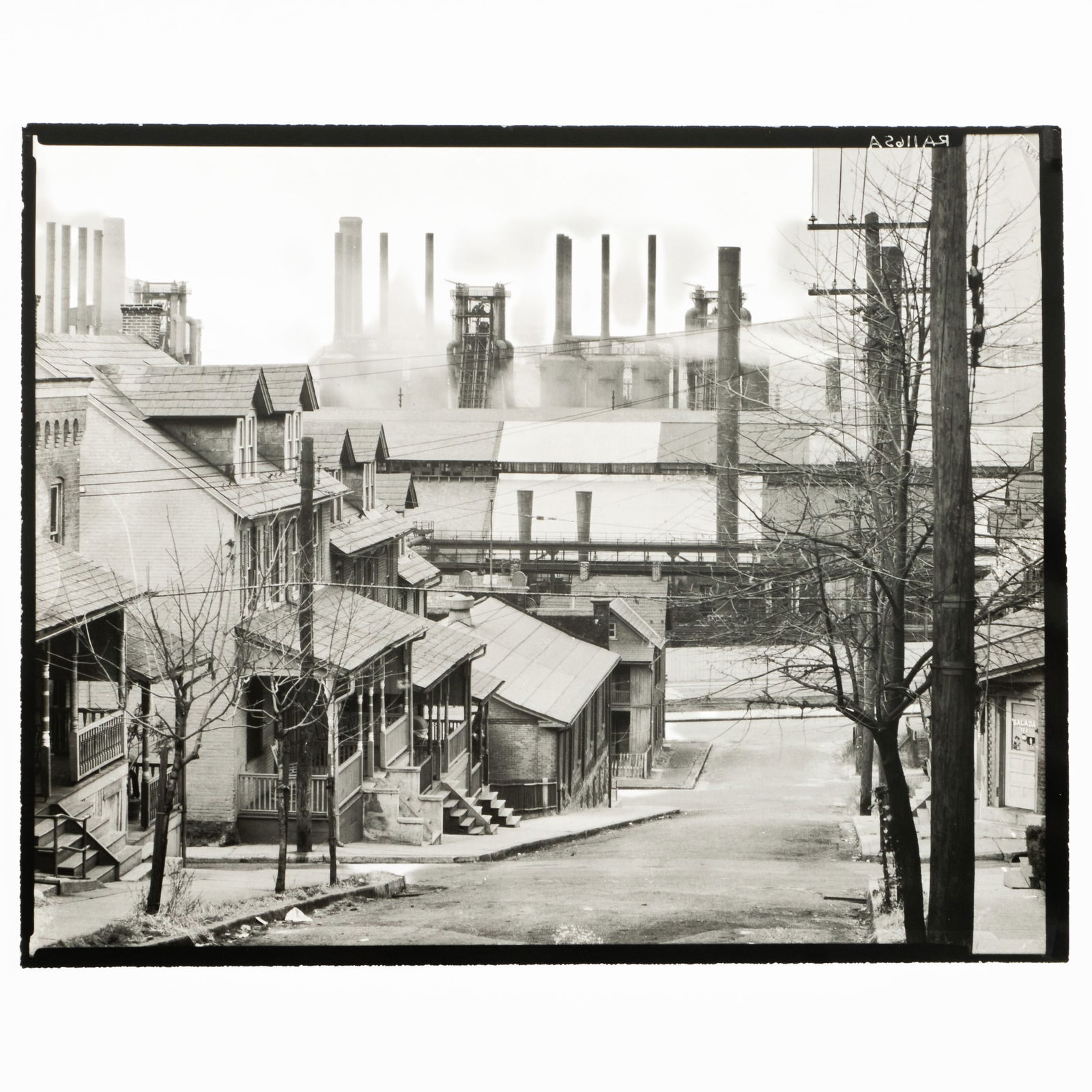 Walker Evans (1903-1975): Bethlehem Houses and Steel Mill, Pennsylvania: Walker Evans (1903-1975): Bethlehem Houses and Steel Mill, Pennsylvania Gelatin silver print, 1935, printed c. 1970 by James Dow, unsigned, variously inscribed in another hand on the reverse. 7 7/8 x