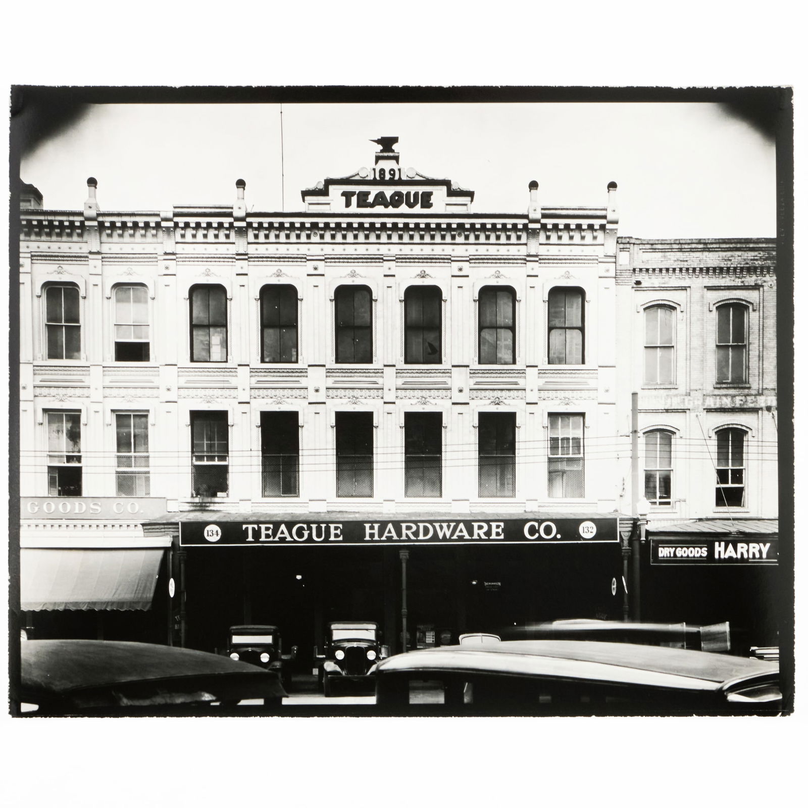 Walker Evans (1903-1975): Block Front in Montgomery, Alabama (Teague Hardware Co.): Walker Evans (1903-1975): Block Front in Montgomery, Alabama (Teague Hardware Co.) Gelatin silver print, 1935-36, printed c. 1970 by James Dow, unsigned, variously inscribed in another hand on the rev